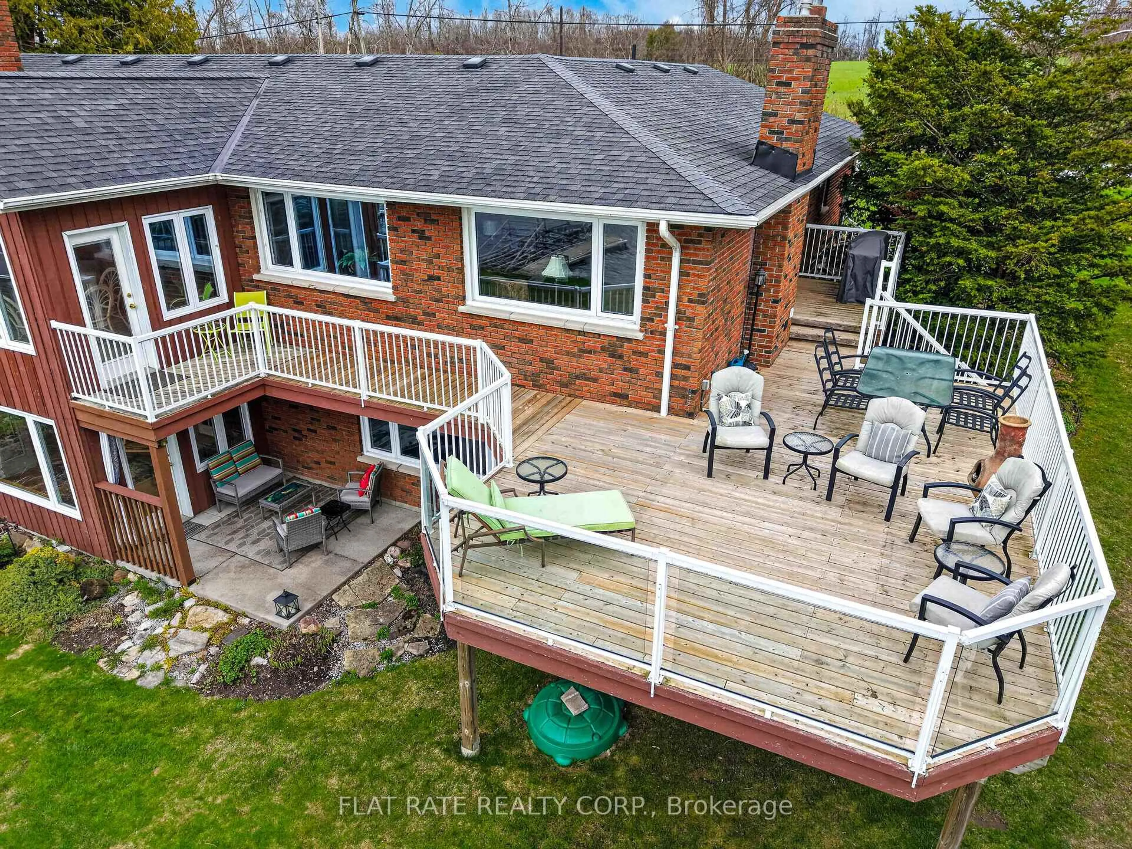 A pic from outside/outdoor area/front of a property/back of a property/a pic from drone, water/lake/river/ocean view for 1927 Pinehurst Ave, Selwyn Ontario K0L 2H0