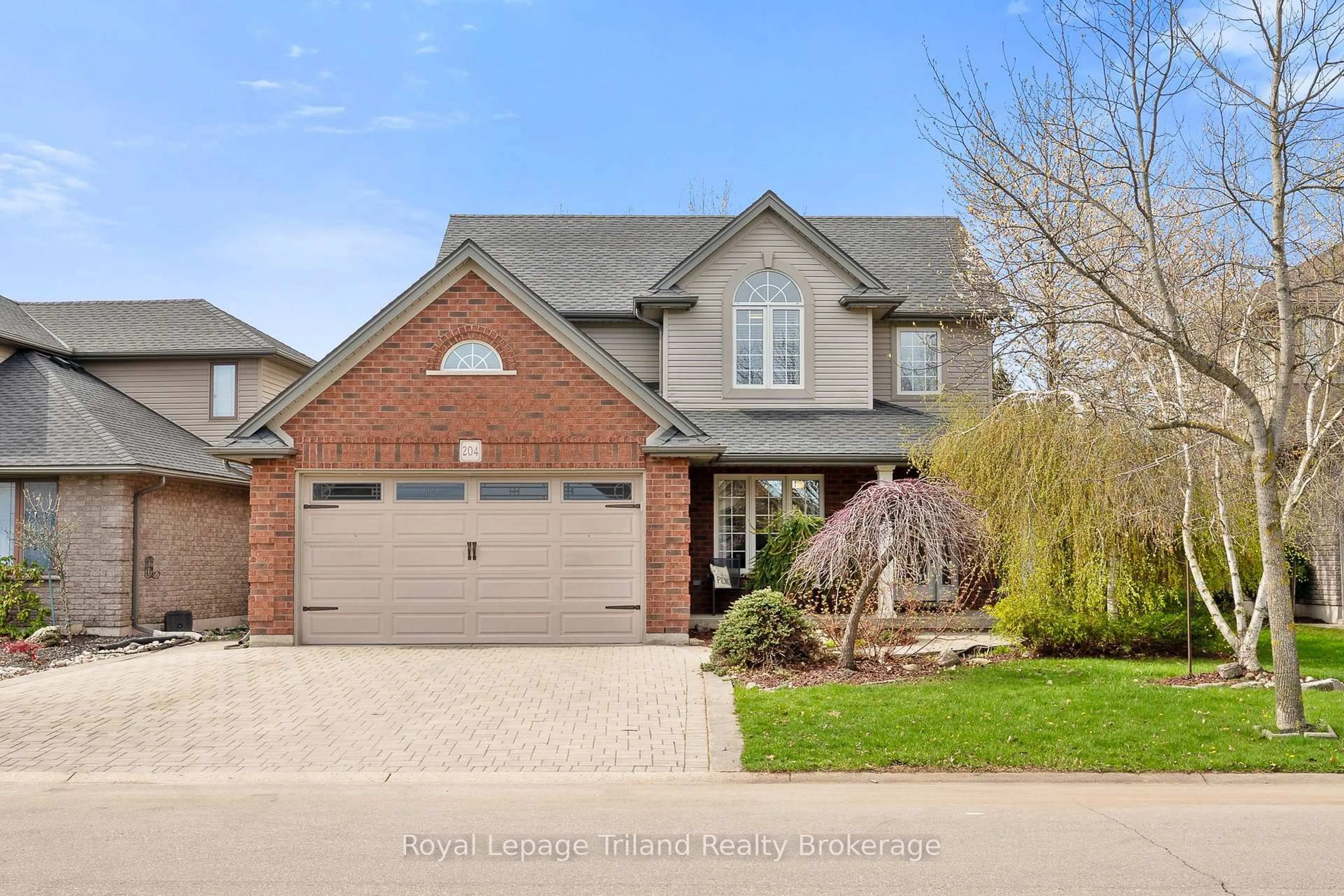 Home with brick exterior material, street for 204 Falcon Dr, Woodstock Ontario N4T 1W5