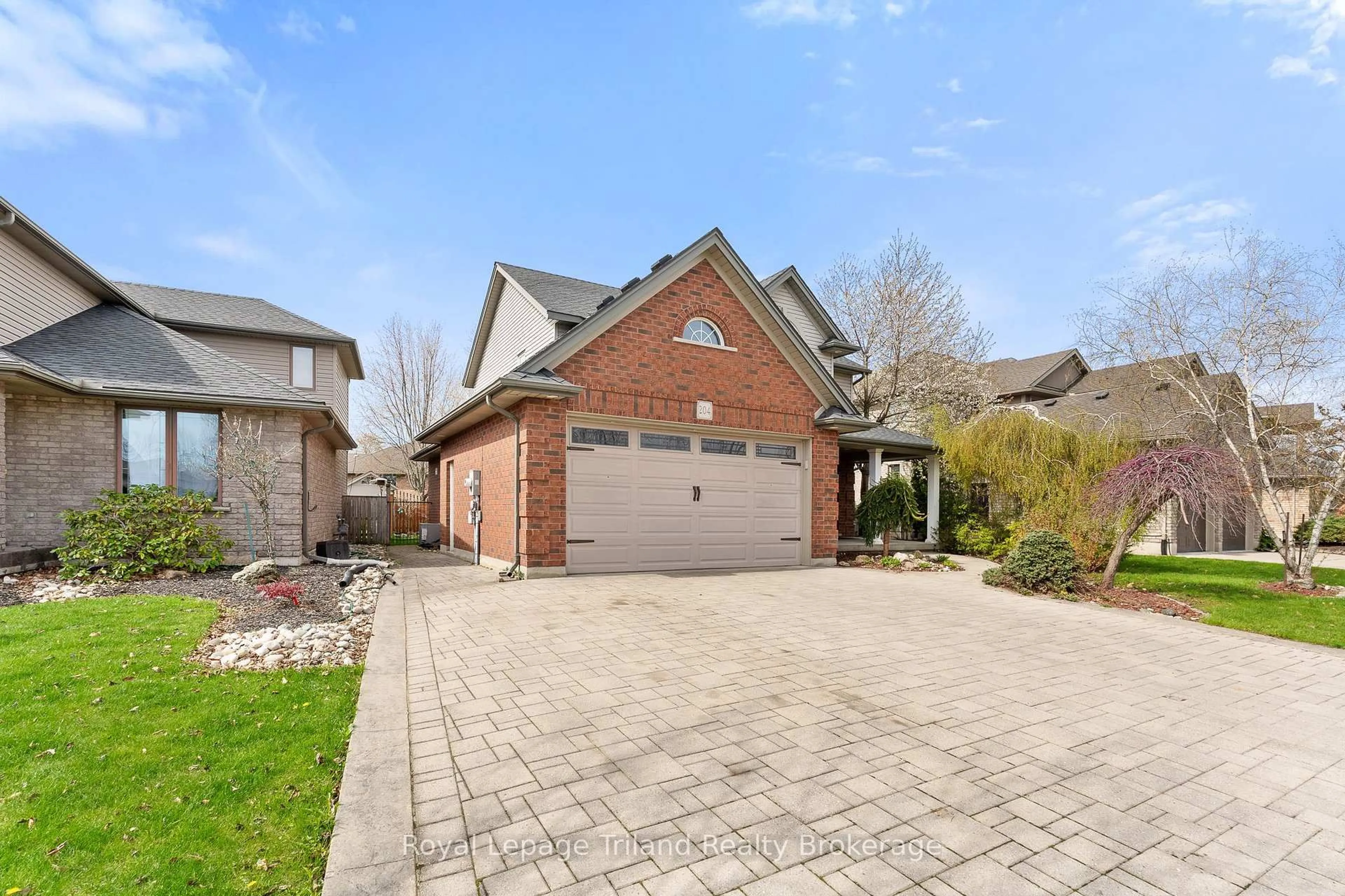 Home with brick exterior material, street for 204 Falcon Dr, Woodstock Ontario N4T 1W5