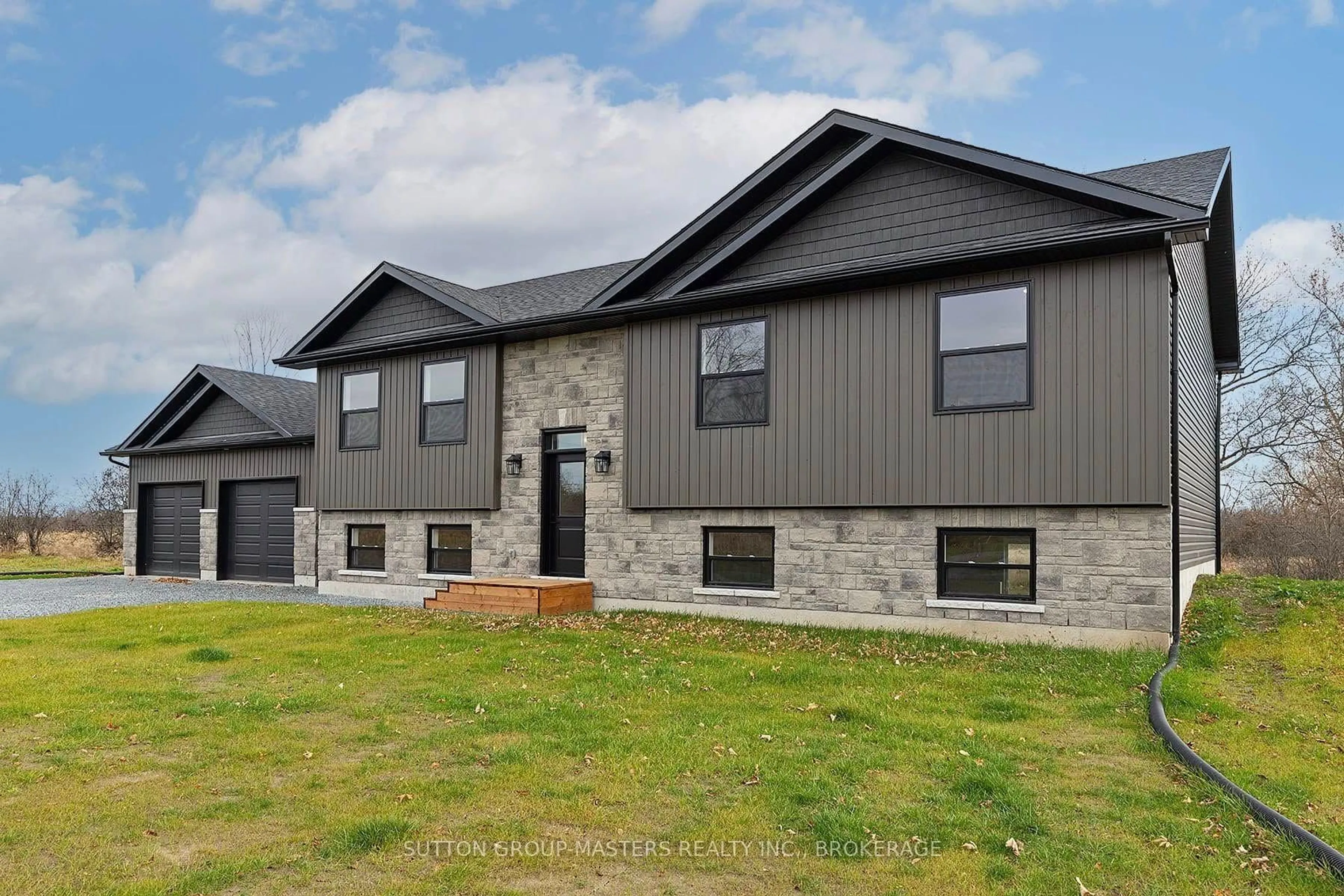 Home with brick exterior material, building for 3893 Round Lake Rd, Inverary Ontario K0H 1X0
