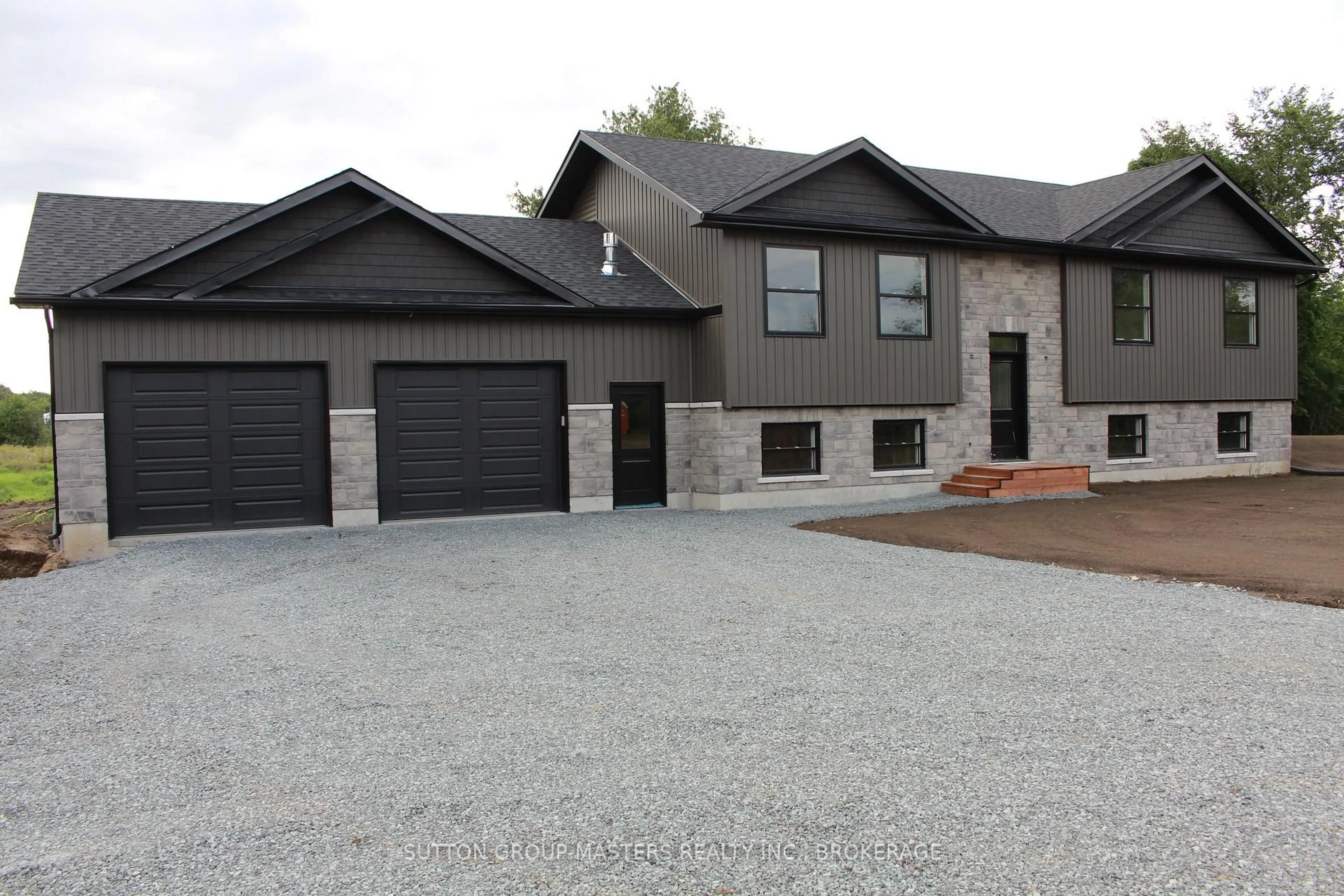 Home with vinyl exterior material, street for 3893 Round Lake Rd, Inverary Ontario K0H 1X0