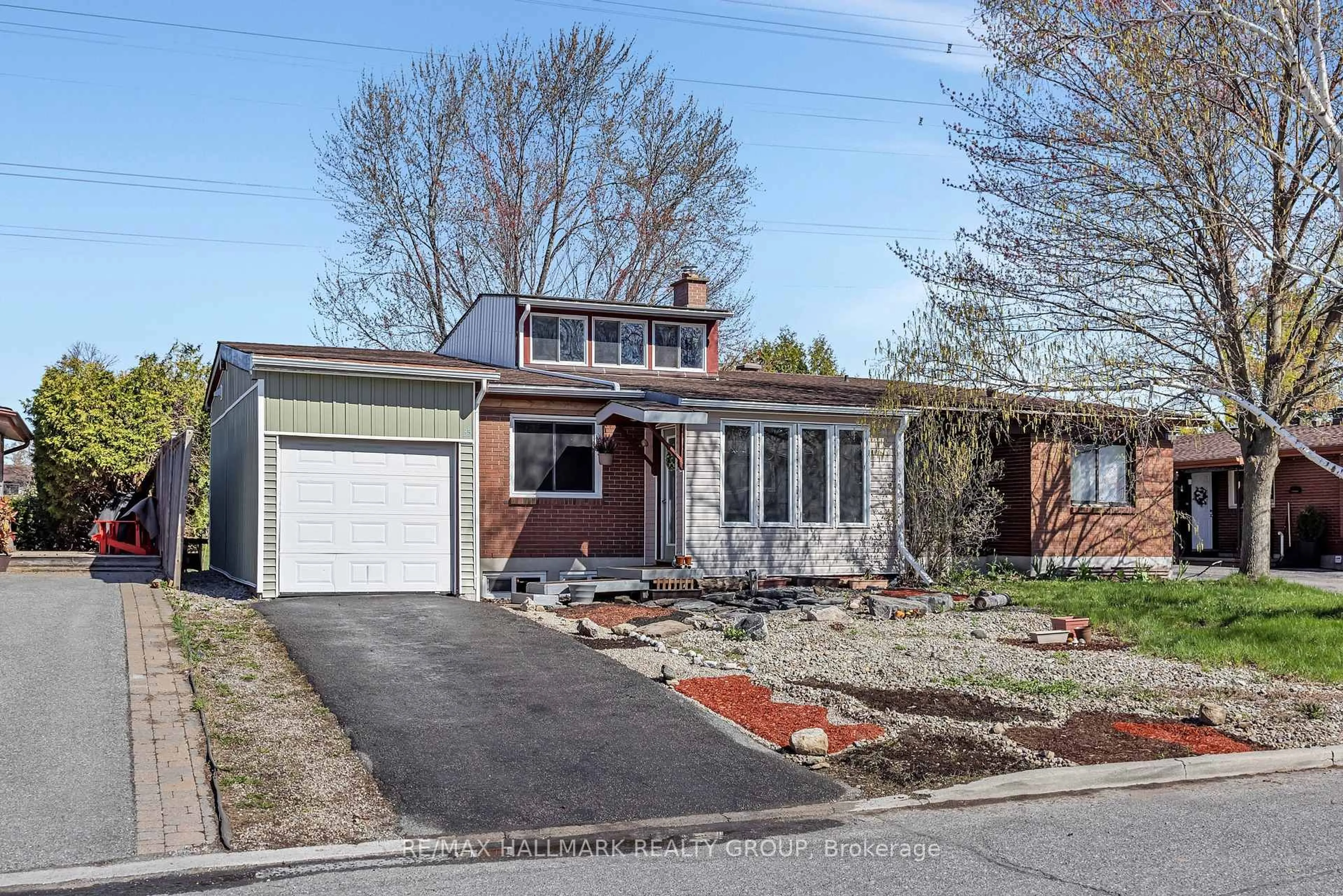 Home with brick exterior material, street for 35 Benlea Dr, Ottawa Ontario K2G 4A3