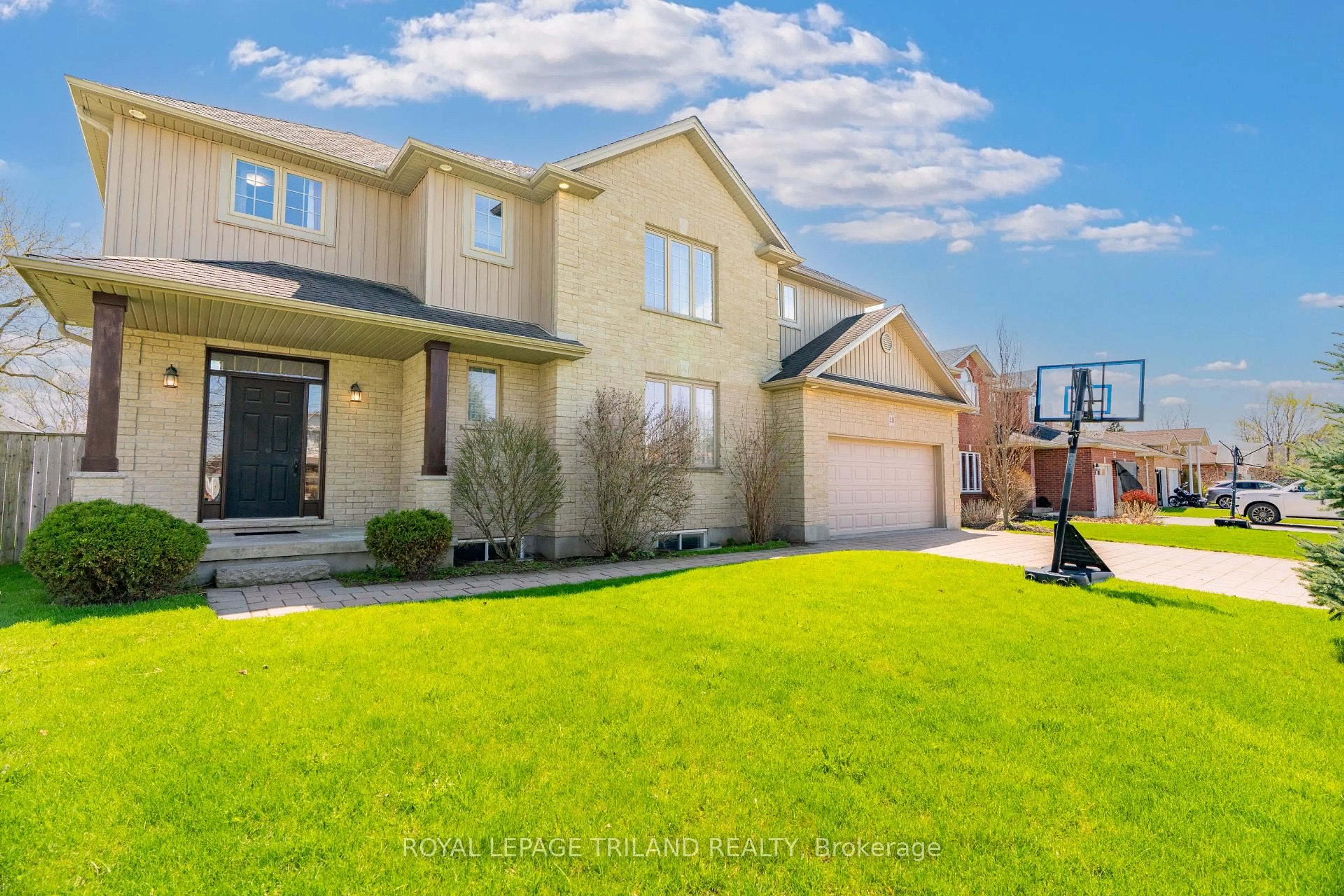 Home with brick exterior material, street for 40 FIELDSTONE Cres, Middlesex Centre Ontario N0L 1R0