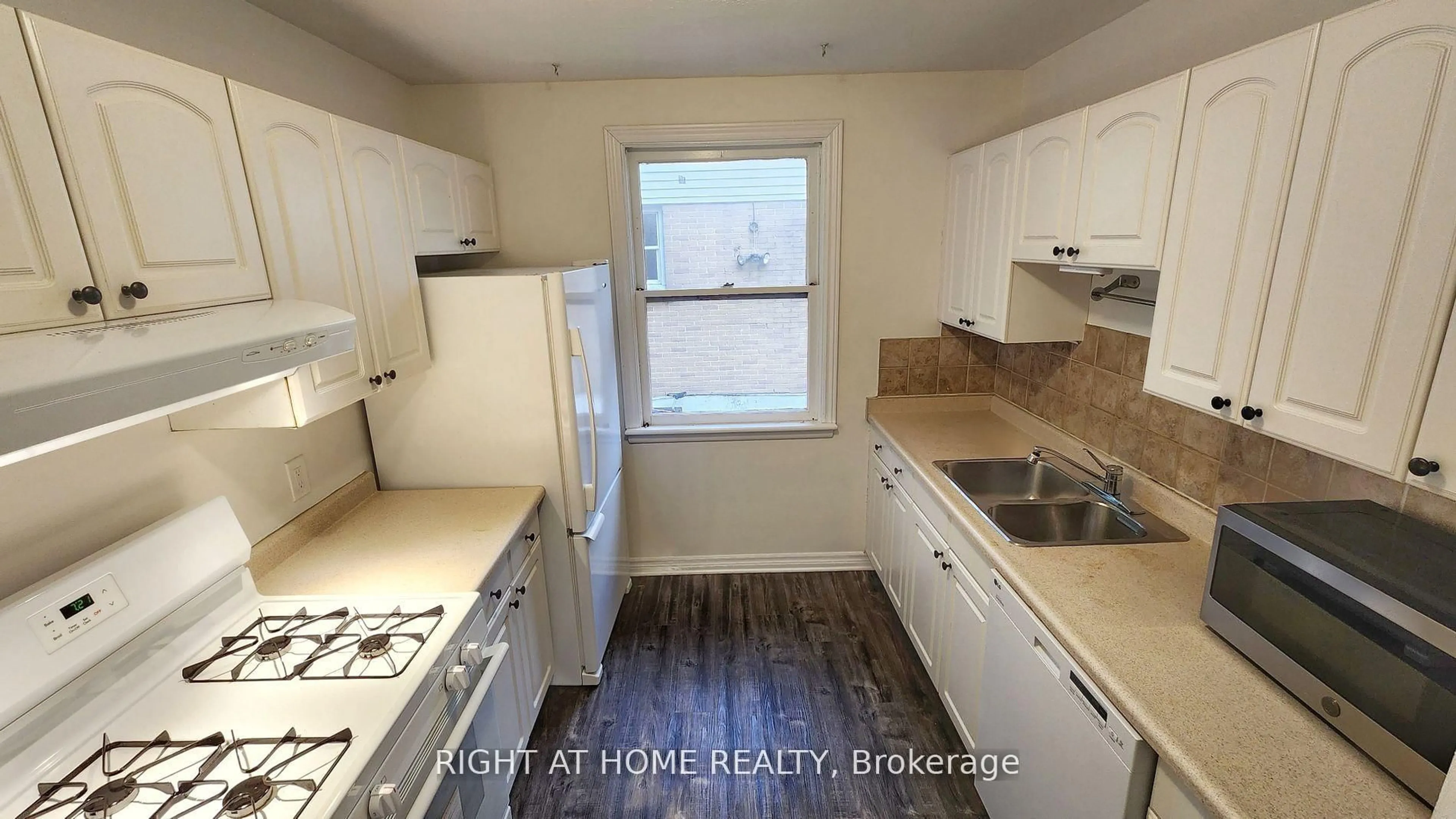 Standard kitchen, wood/laminate floor for 87 Radford St, Hamilton Ontario L8S 3E5