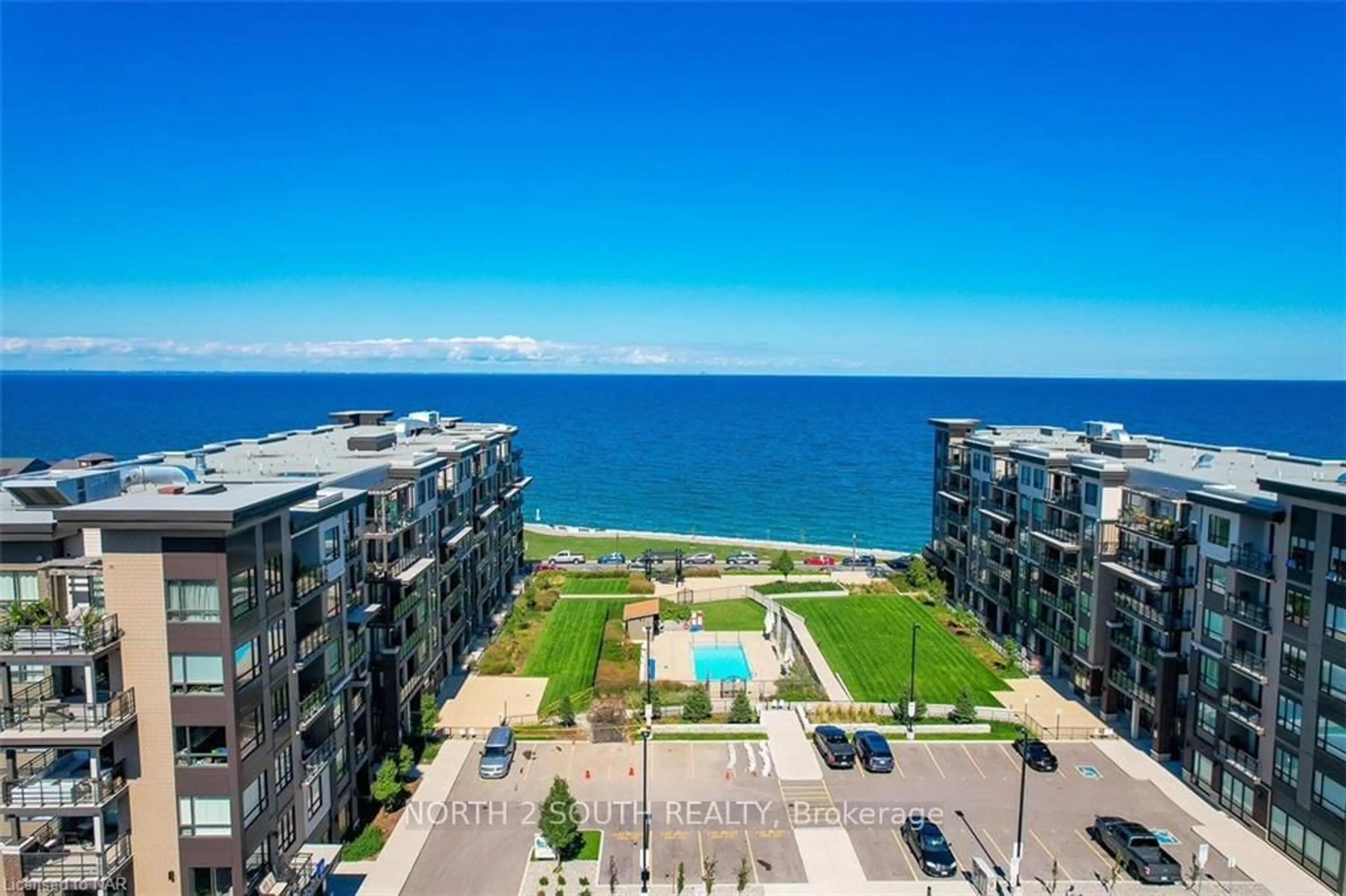 A pic from outside/outdoor area/front of a property/back of a property/a pic from drone, water/lake/river/ocean view for 40 Esplanade Lane #408, Grimsby Ontario L3M 0G9