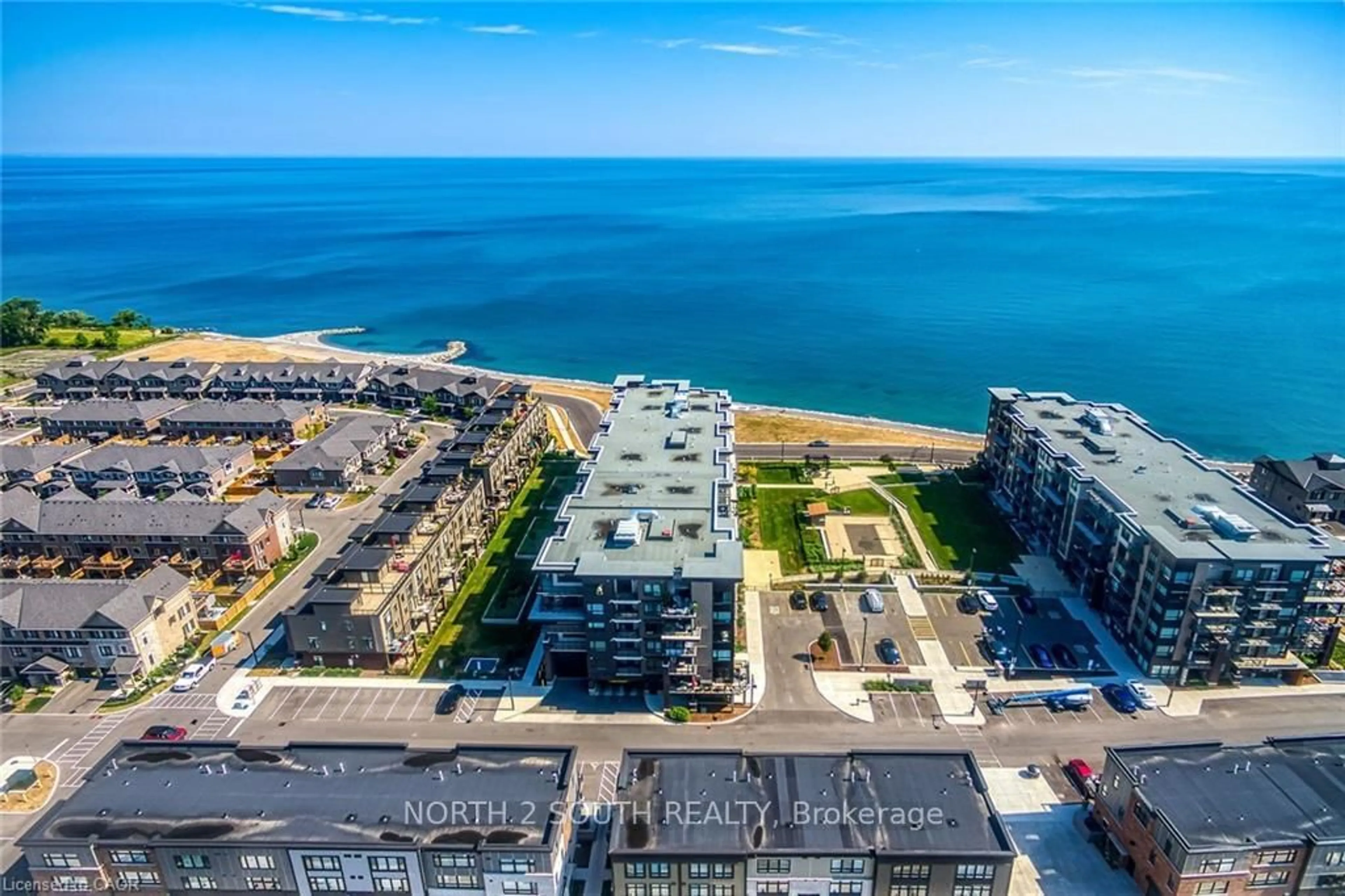 A pic from outside/outdoor area/front of a property/back of a property/a pic from drone, water/lake/river/ocean view for 40 Esplanade Lane #408, Grimsby Ontario L3M 0G9