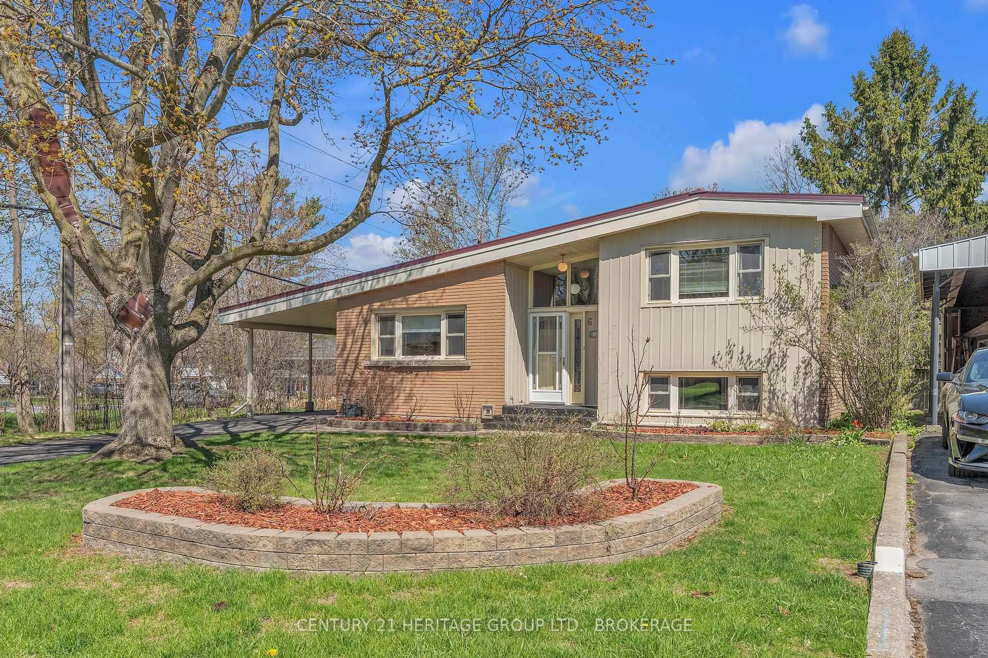 Home with vinyl exterior material, street for 69 Campbell Cres, Kingston Ontario K7M 1Z6