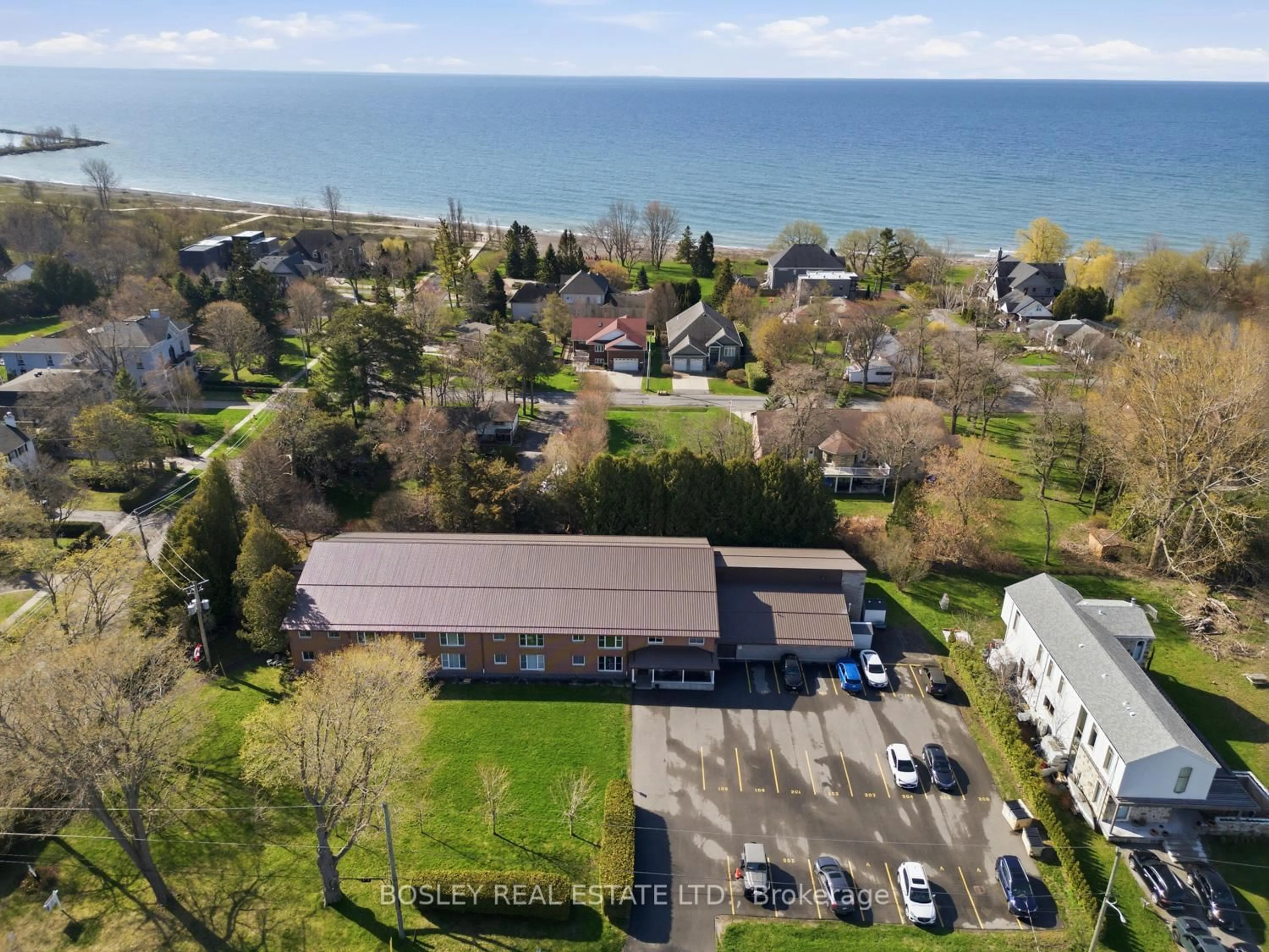 A pic from outside/outdoor area/front of a property/back of a property/a pic from drone, water/lake/river/ocean view for 133 Ontario St #201, Cobourg Ontario K9A 3B4
