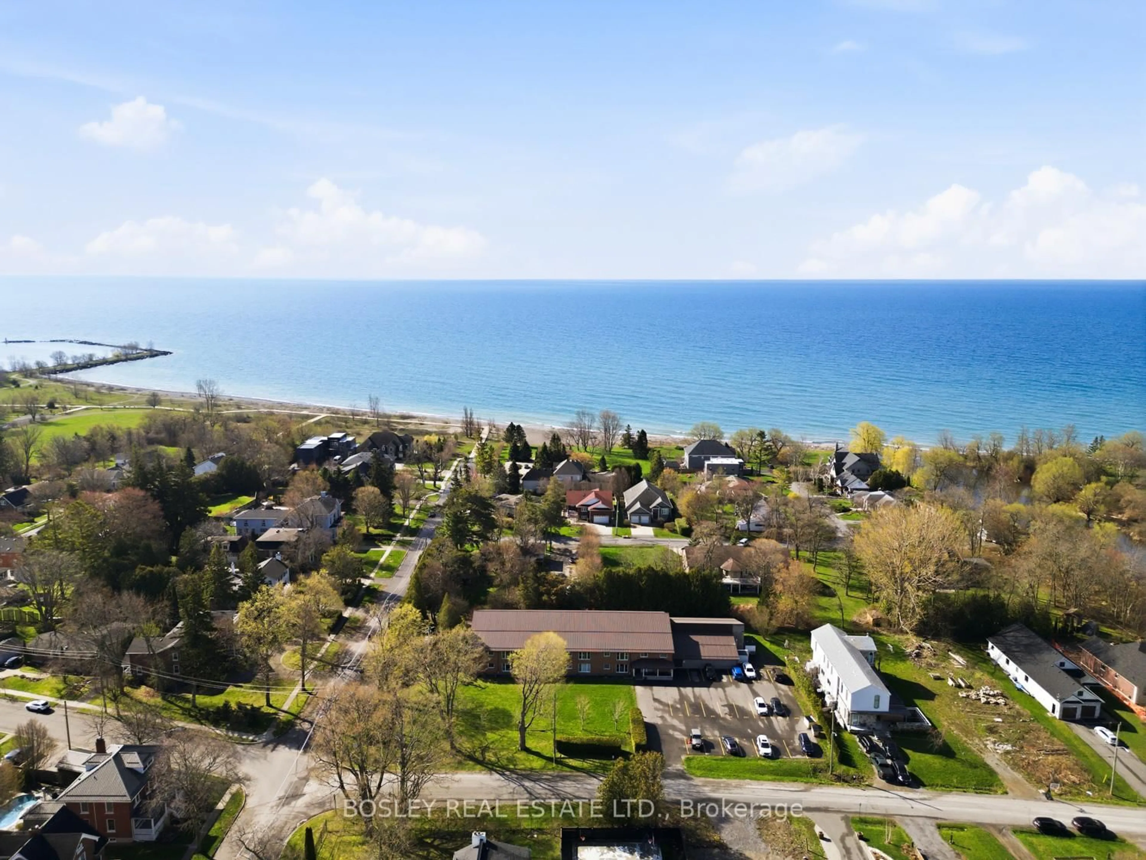 A pic from outside/outdoor area/front of a property/back of a property/a pic from drone, water/lake/river/ocean view for 133 Ontario St #201, Cobourg Ontario K9A 3B4