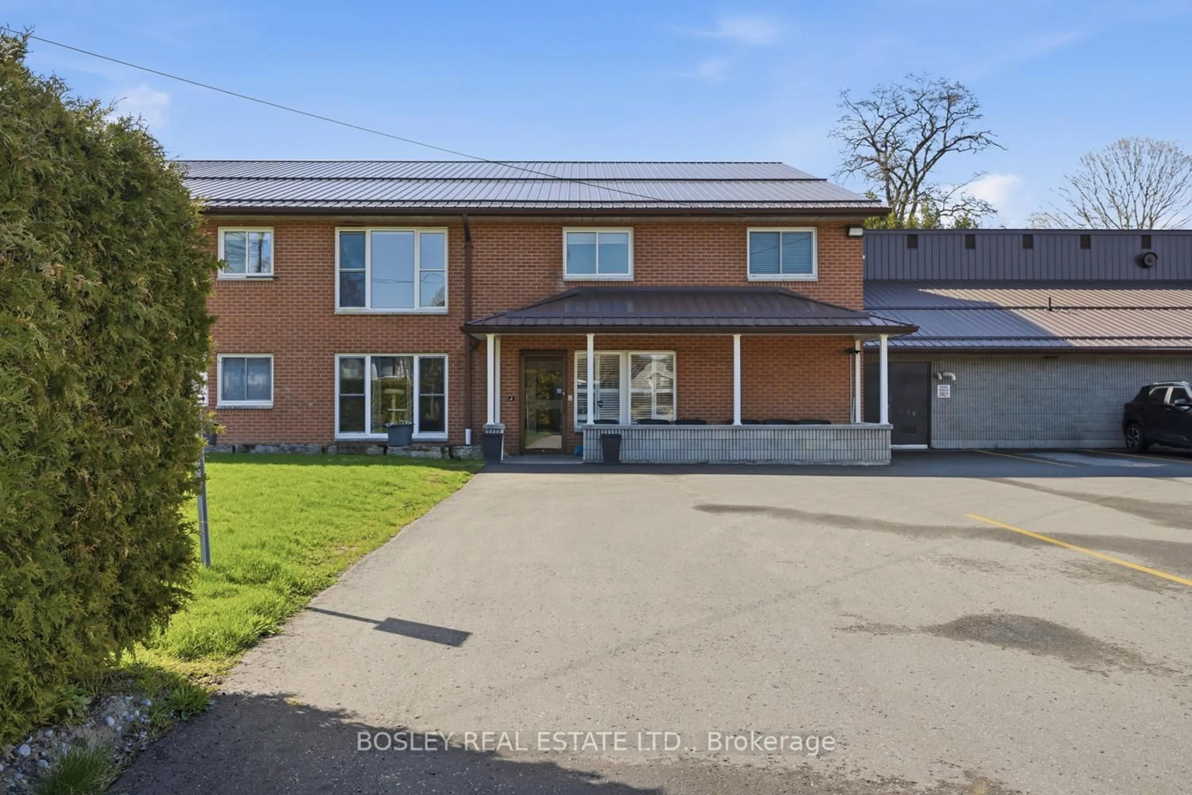 A pic from outside/outdoor area/front of a property/back of a property/a pic from drone, street for 133 Ontario St #201, Cobourg Ontario K9A 3B4