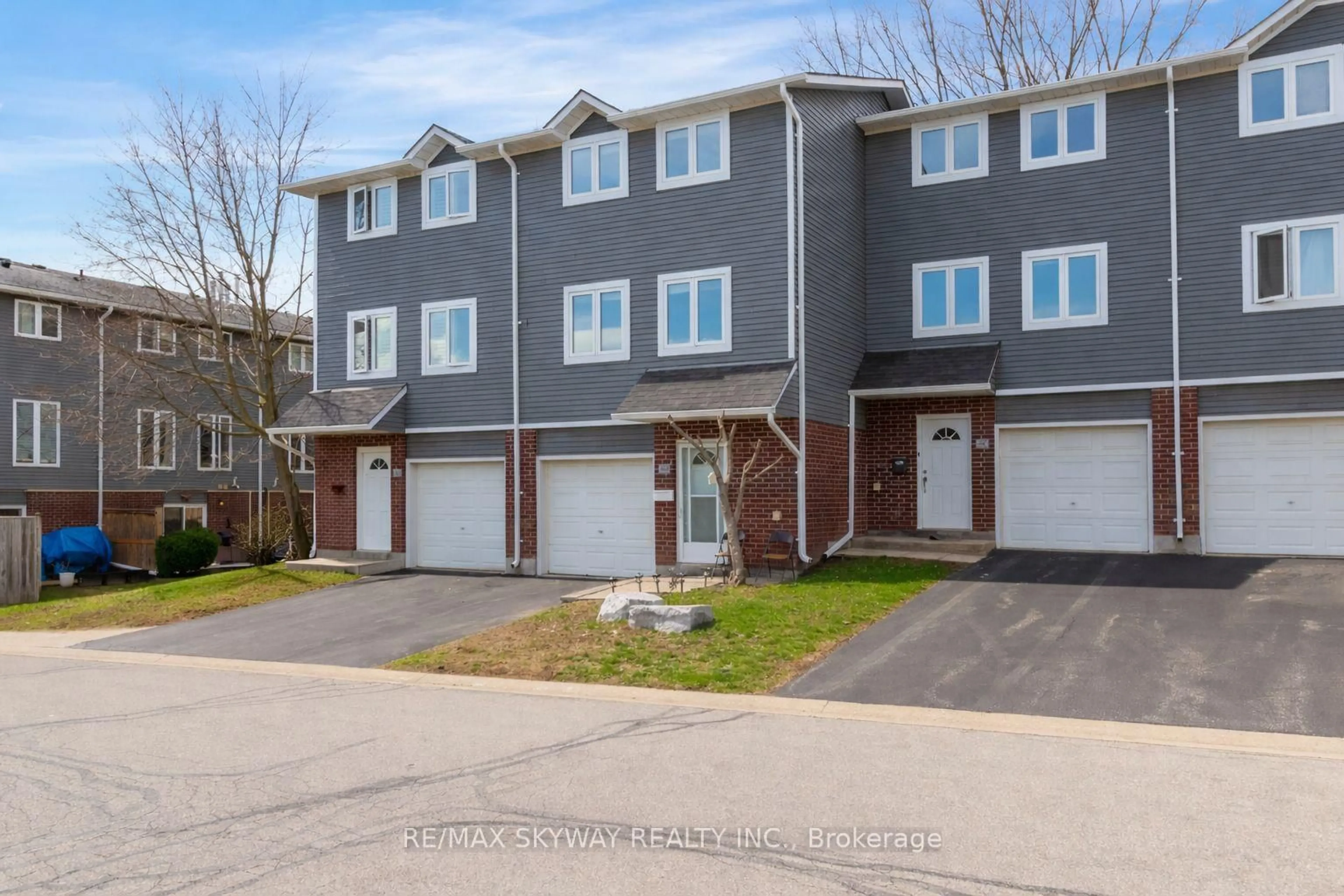 A pic from outside/outdoor area/front of a property/back of a property/a pic from drone, street for 56 Harris Ave #B, Brantford Ontario N3R 2E9