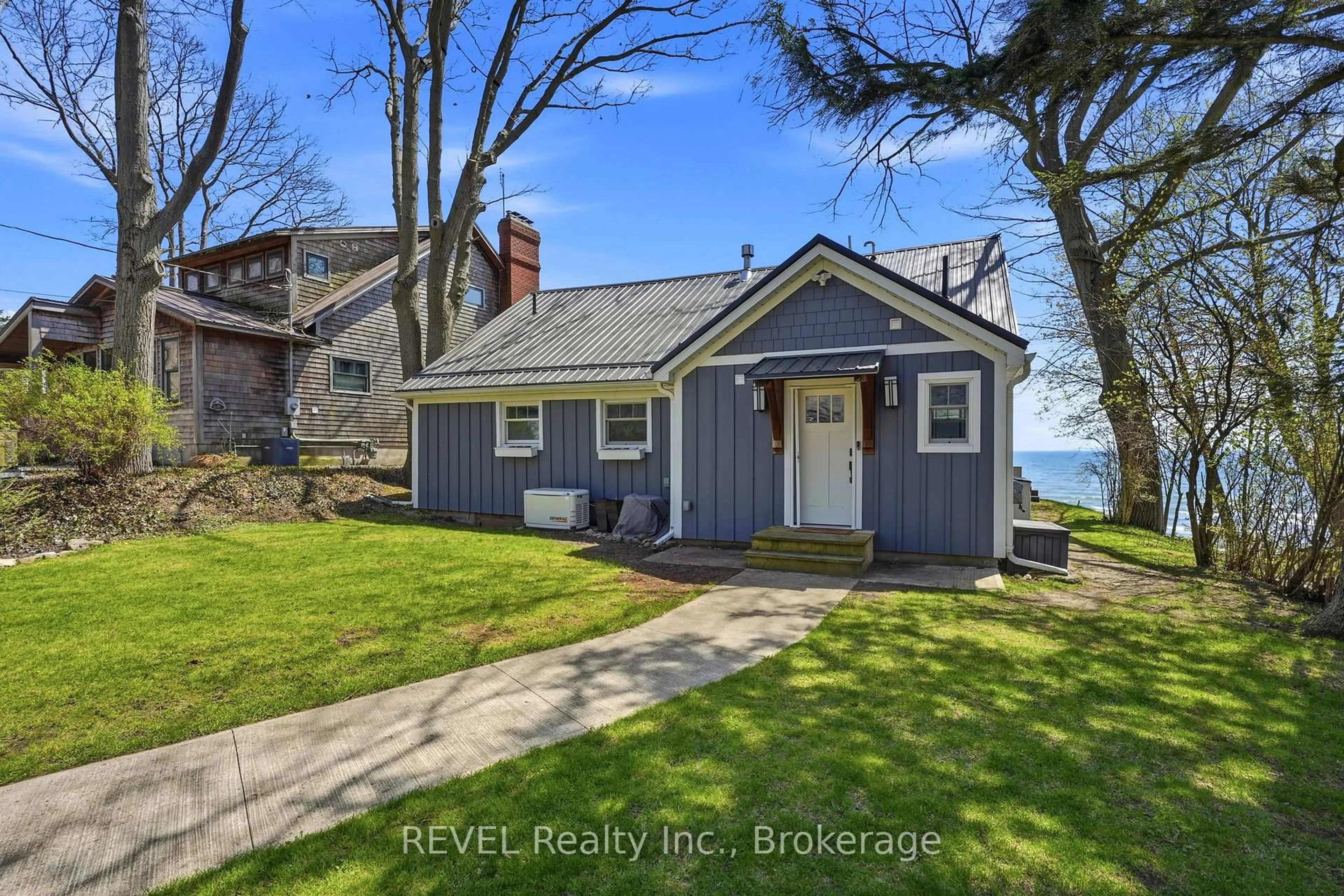A pic from outside/outdoor area/front of a property/back of a property/a pic from drone, water/lake/river/ocean view for 3513 Firelane 12, Port Colborne Ontario L3K 5V3