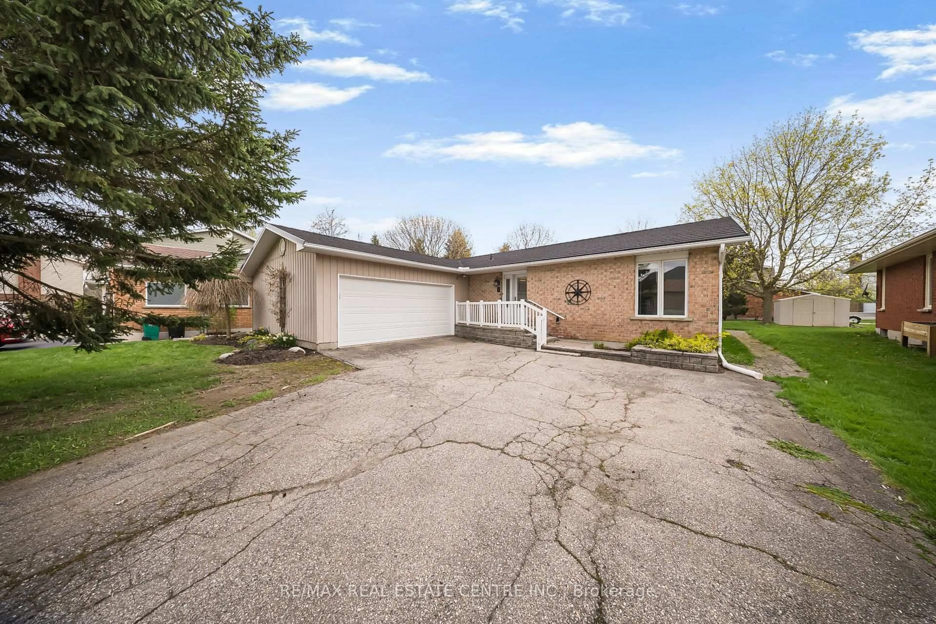 A pic from outside/outdoor area/front of a property/back of a property/a pic from drone, street for 9 Village Rd, Wellesley Ontario N0B 2T0