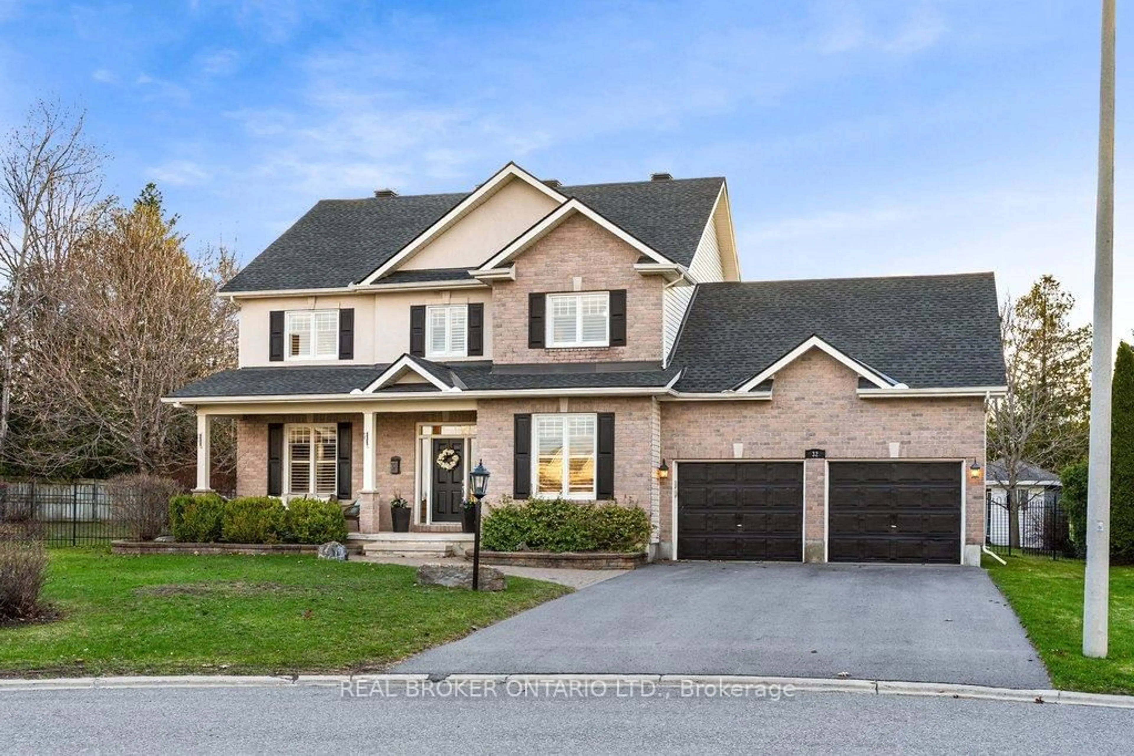 Home with brick exterior material, street for 32 Feldspar Cres, Stittsville Ontario K2S 1Y3