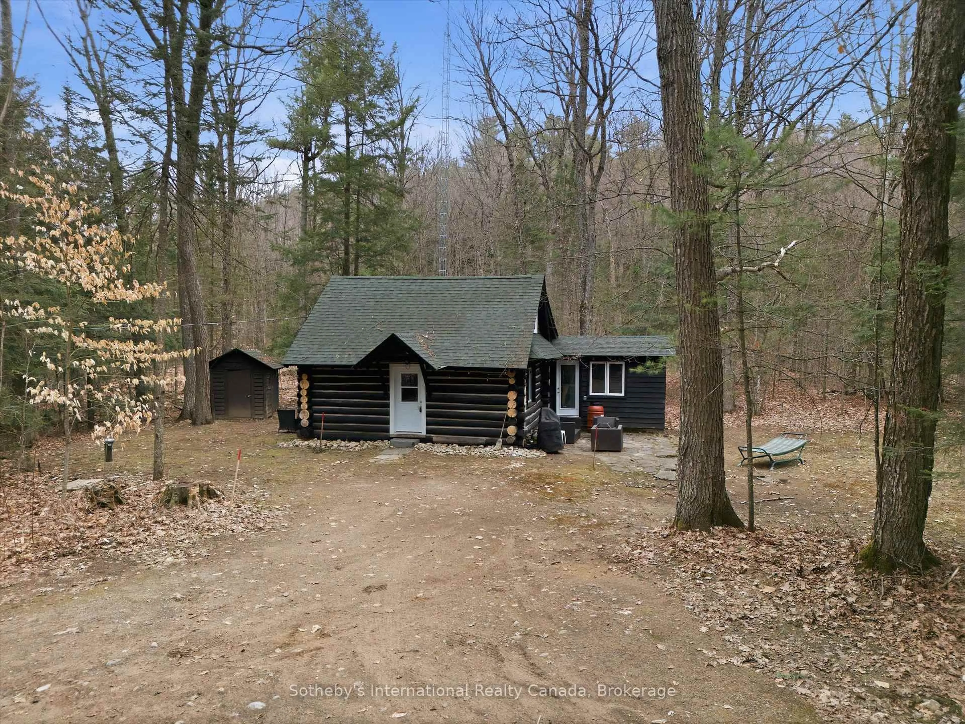 A pic from outside/outdoor area/front of a property/back of a property/a pic from drone, forest/trees view for 1100 Old Hwy 117 Highway, Lake of Bays Ontario P0B 1A0