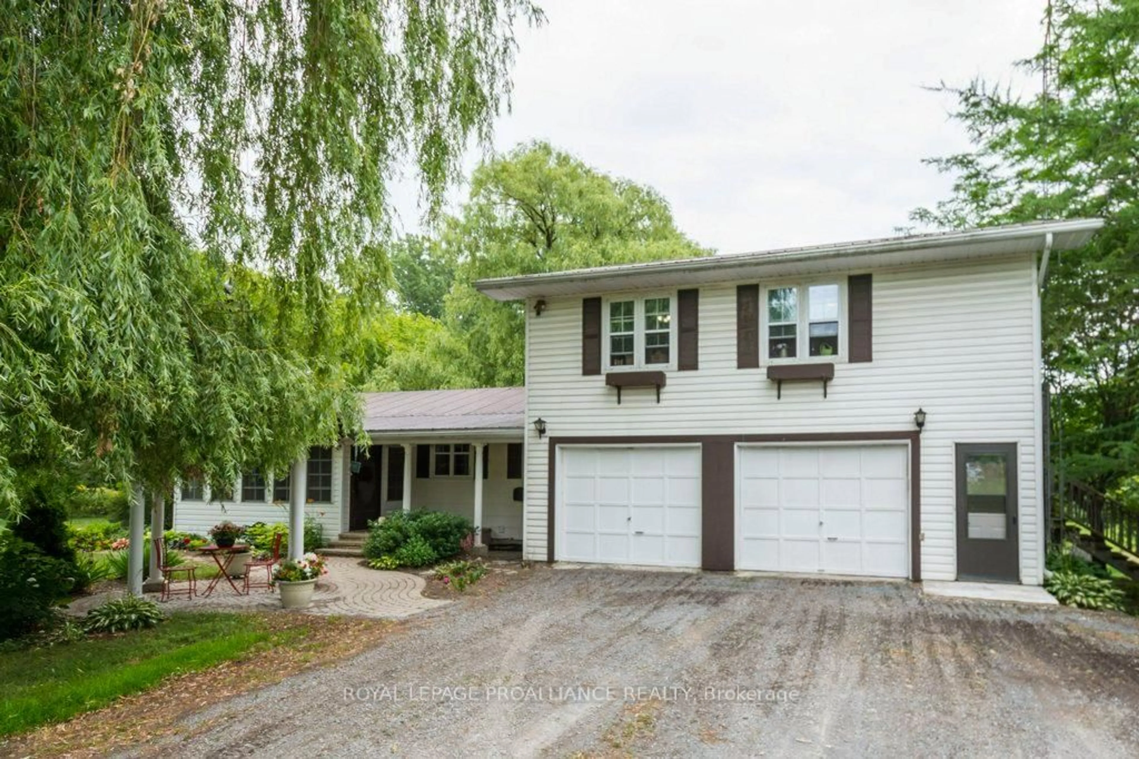Home with vinyl exterior material, street for 21 Storms Lane, Prince Edward County Ontario K0K 2P0