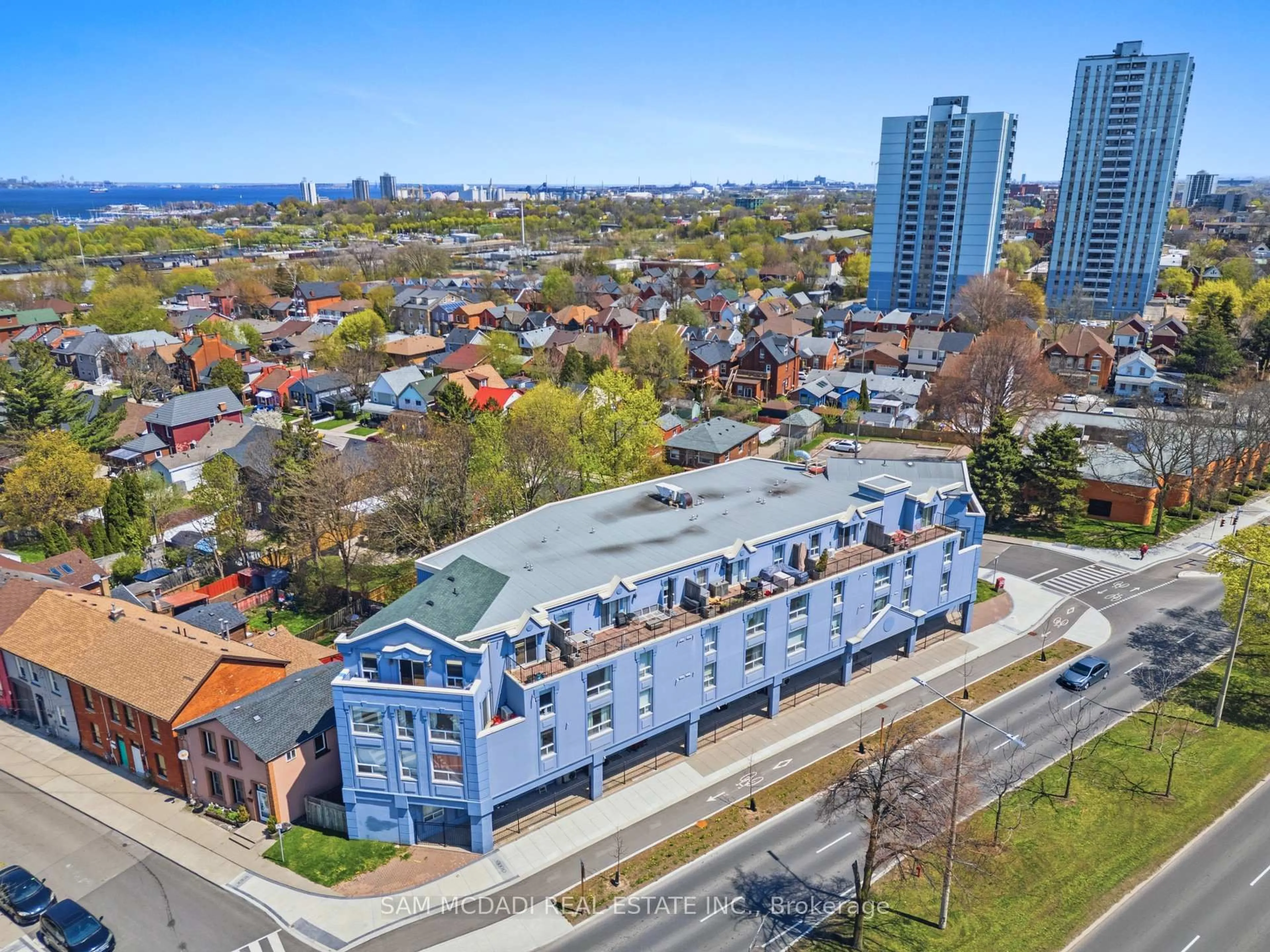 A pic from outside/outdoor area/front of a property/back of a property/a pic from drone, city buildings view from balcony for 400 York Blvd #201, Hamilton Ontario L8R 3M5