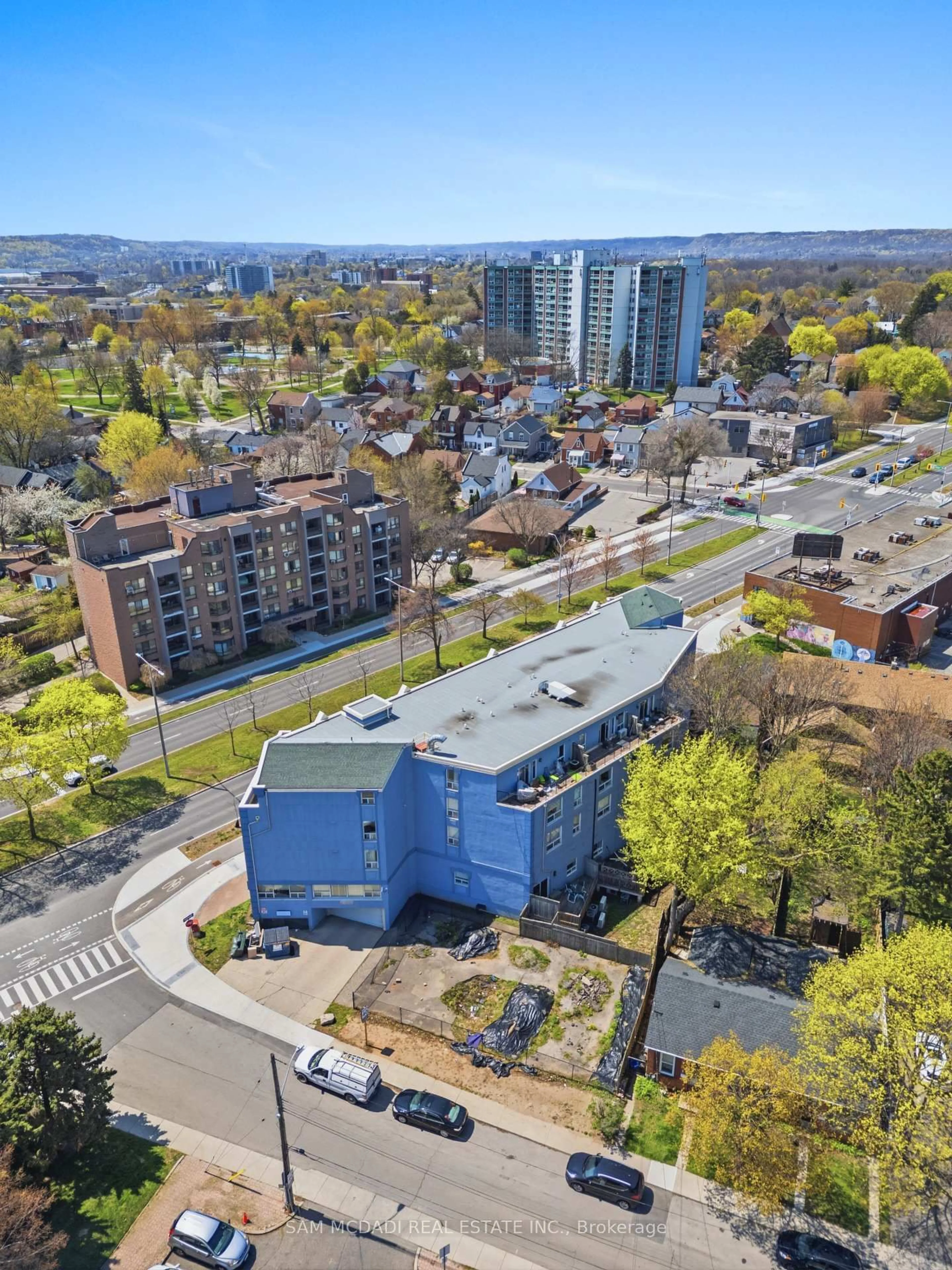 A pic from outside/outdoor area/front of a property/back of a property/a pic from drone, city buildings view from balcony for 400 York Blvd #201, Hamilton Ontario L8R 3M5