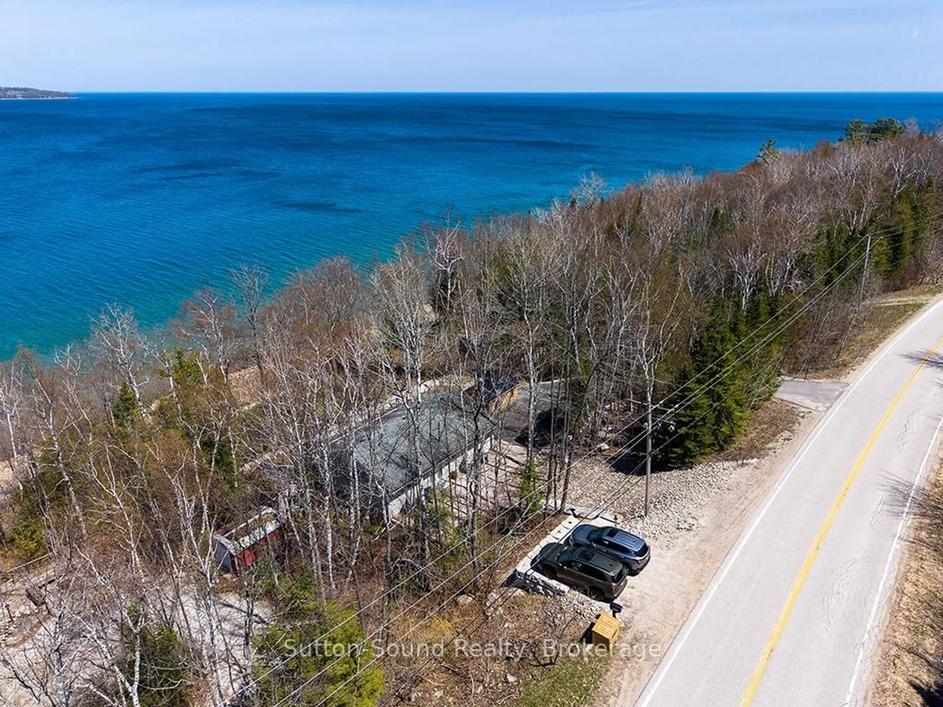 A pic from outside/outdoor area/front of a property/back of a property/a pic from drone, water/lake/river/ocean view for 504389 GREY ROAD 1, Georgian Bluffs Ontario N0H 2T0