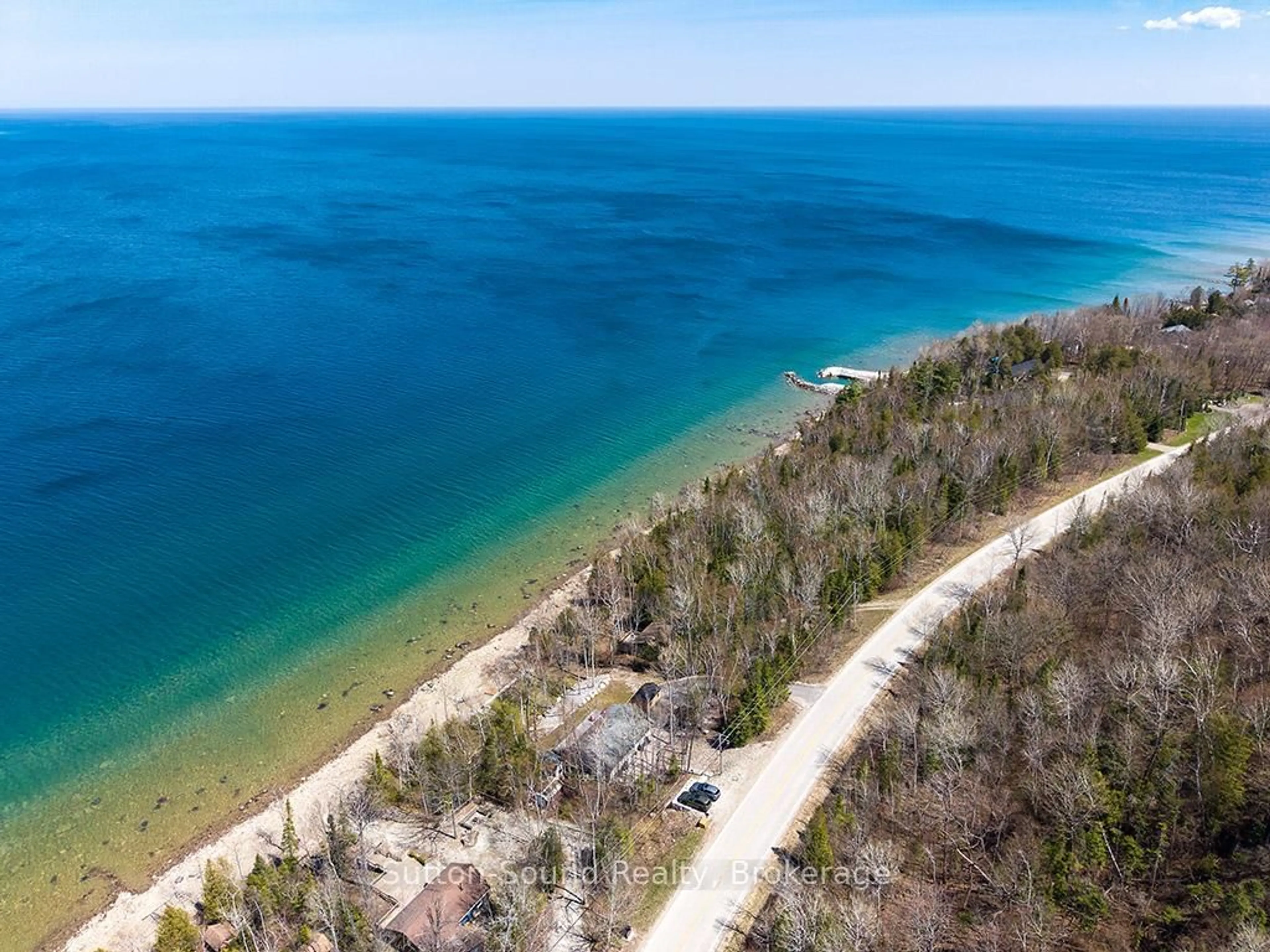 A pic from outside/outdoor area/front of a property/back of a property/a pic from drone, water/lake/river/ocean view for 504389 GREY ROAD 1, Georgian Bluffs Ontario N0H 2T0
