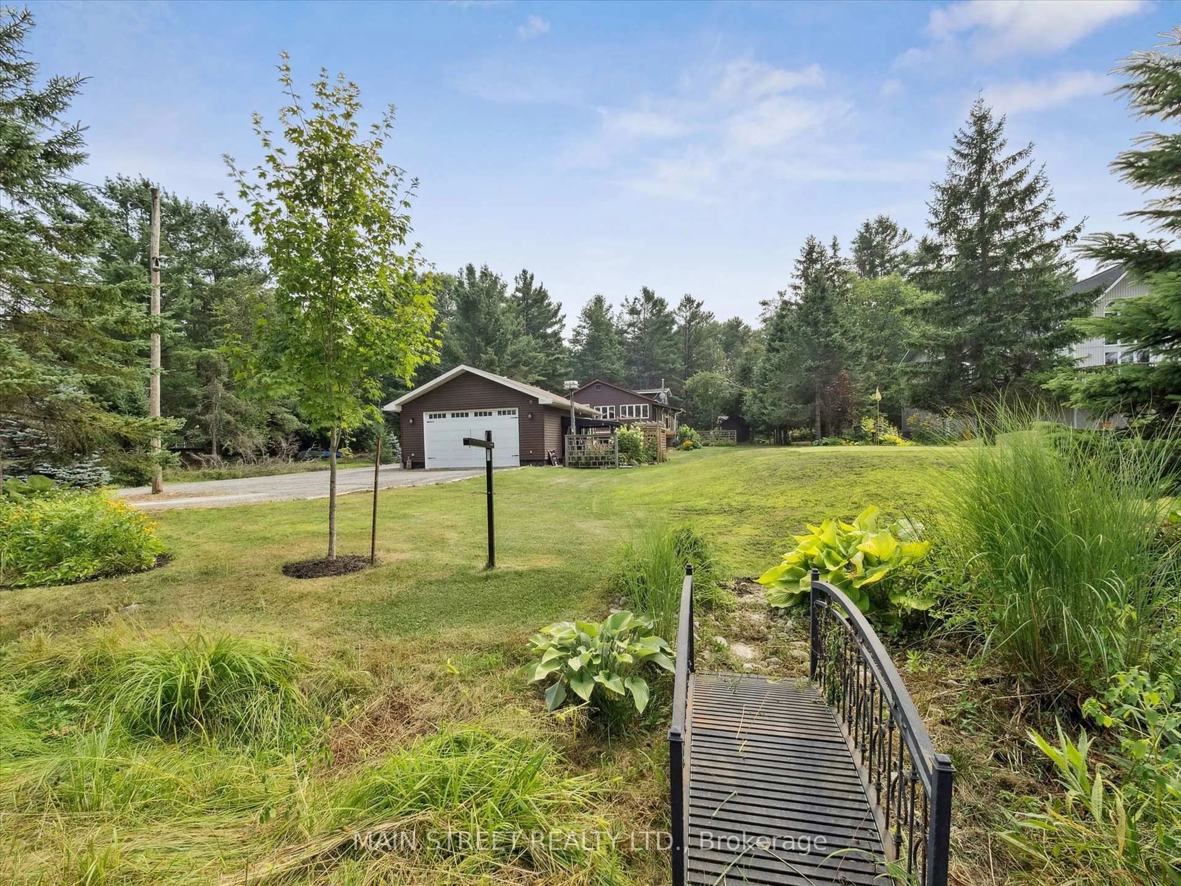 A pic from outside/outdoor area/front of a property/back of a property/a pic from drone, forest/trees view for 1183 South Morrison Lake Rd, Gravenhurst Ontario P0E 1G0