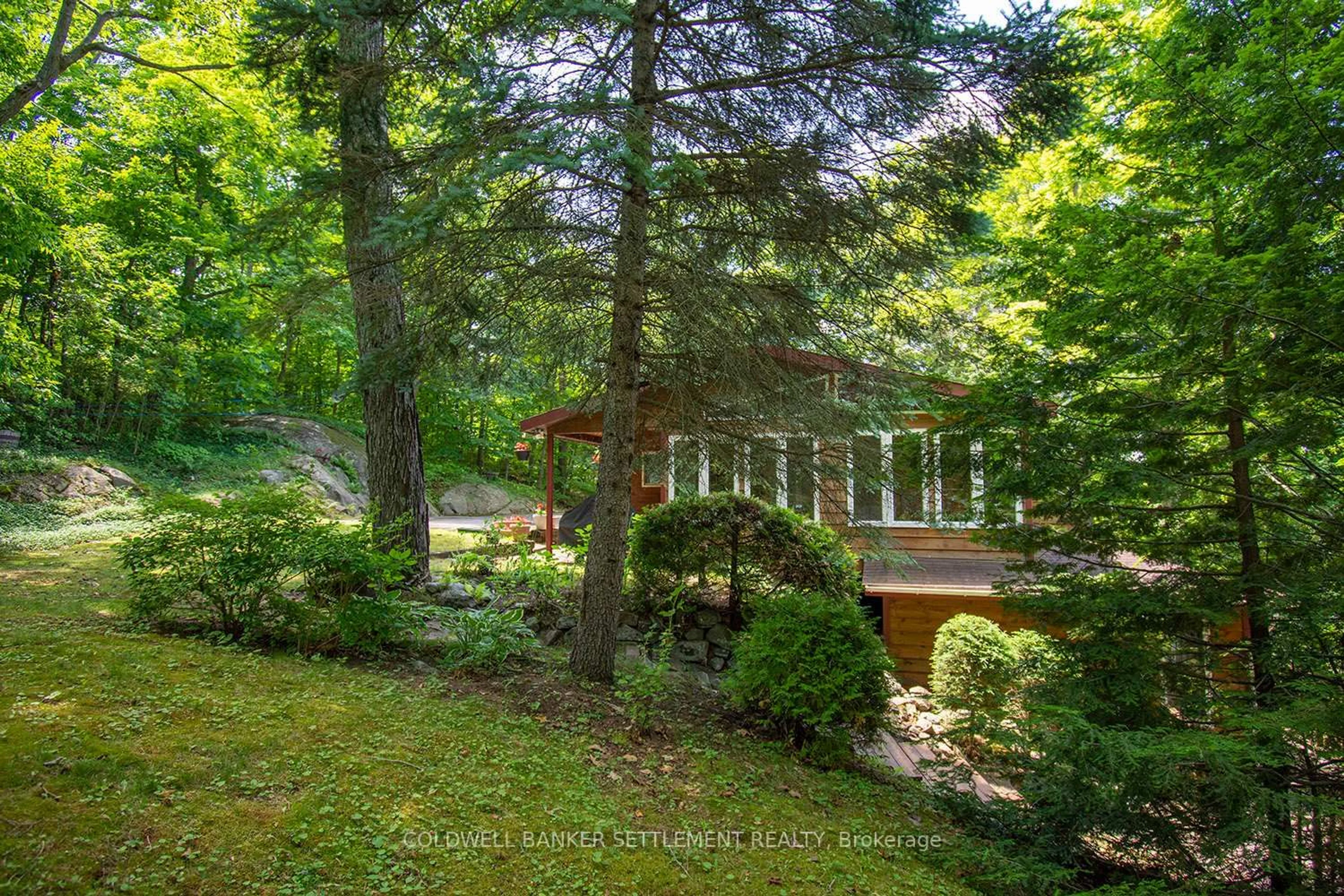 A pic from outside/outdoor area/front of a property/back of a property/a pic from drone, forest/trees view for 1136c Northview Lane, Sharbot Lake Ontario K0H 2P0