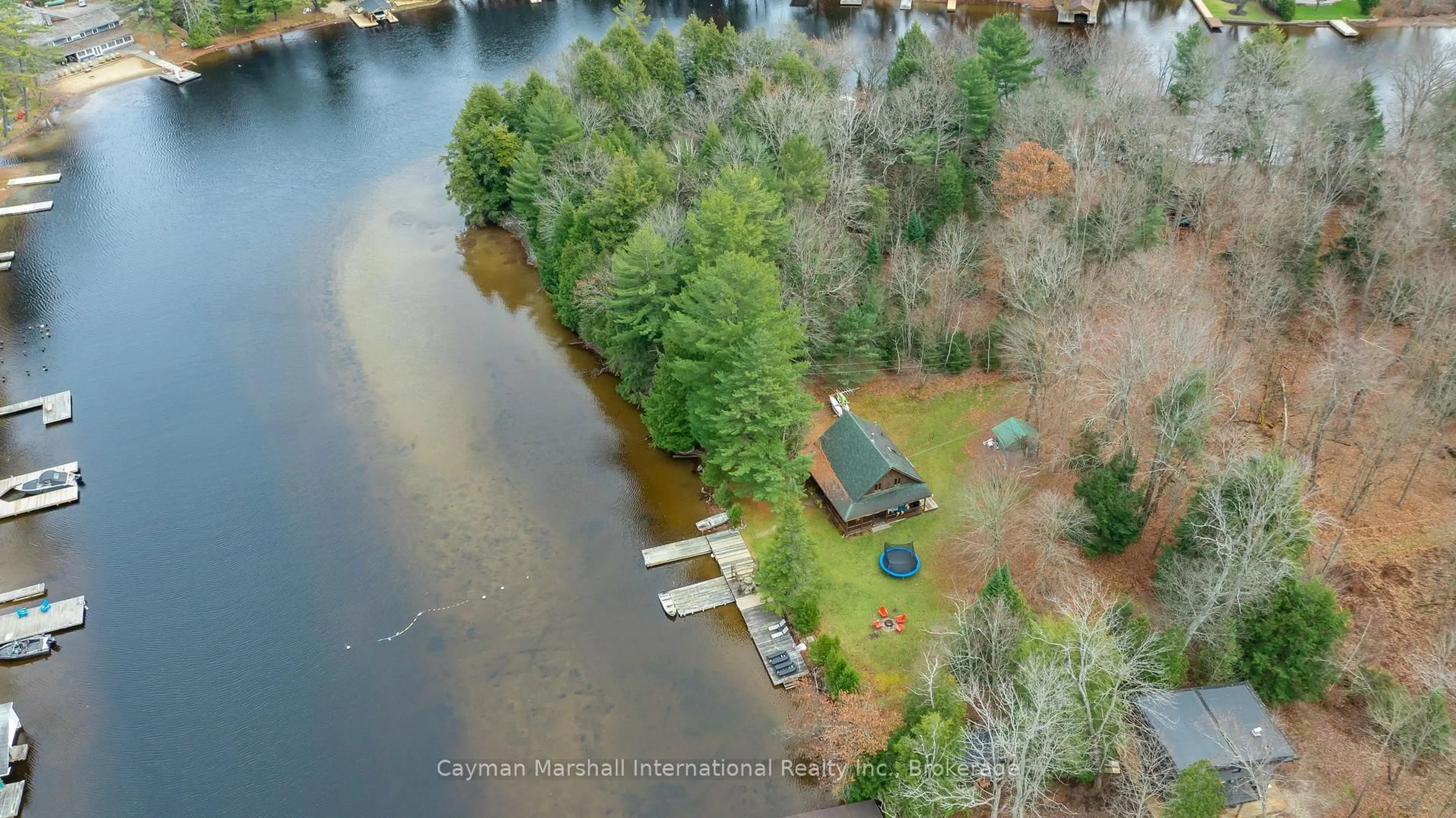 A pic from outside/outdoor area/front of a property/back of a property/a pic from drone, water/lake/river/ocean view for 30 Mcvittie Island, Bracebridge Ontario P1L 1W8