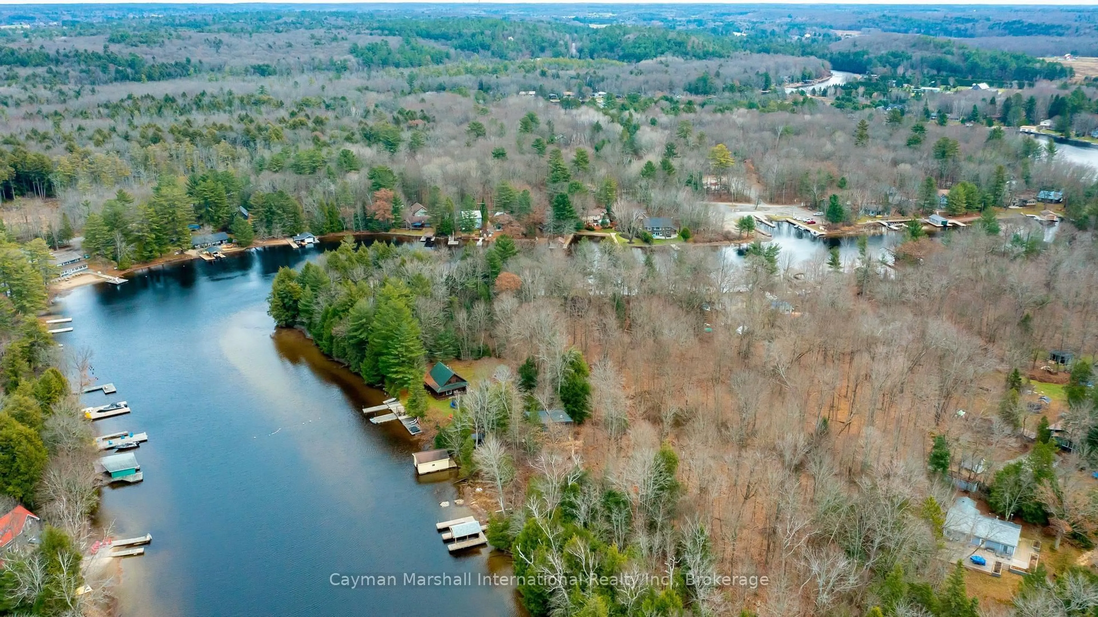 A pic from outside/outdoor area/front of a property/back of a property/a pic from drone, water/lake/river/ocean view for 30 Mcvittie Island, Bracebridge Ontario P1L 1W8