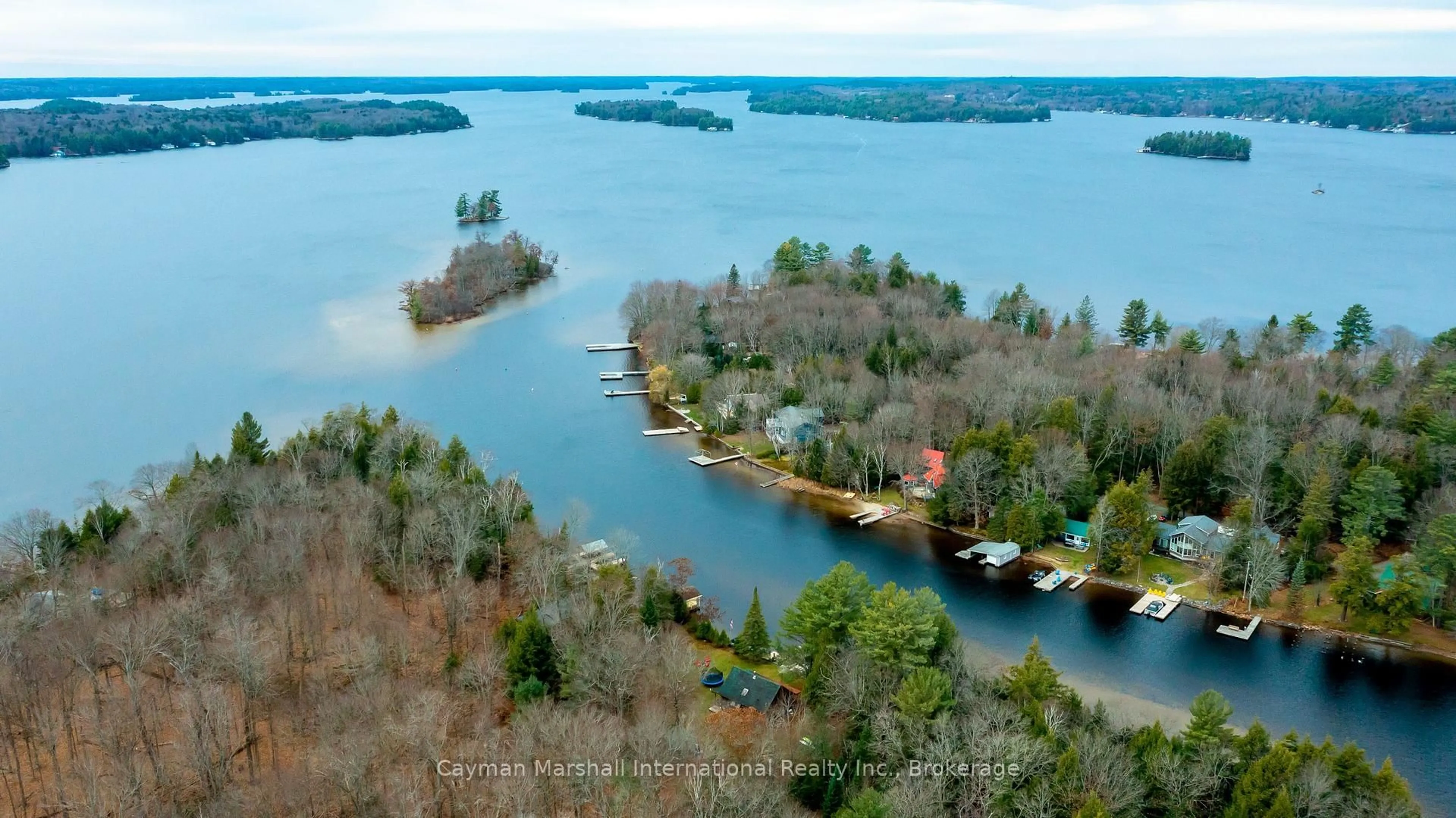 A pic from outside/outdoor area/front of a property/back of a property/a pic from drone, water/lake/river/ocean view for 30 Mcvittie Island, Bracebridge Ontario P1L 1W8