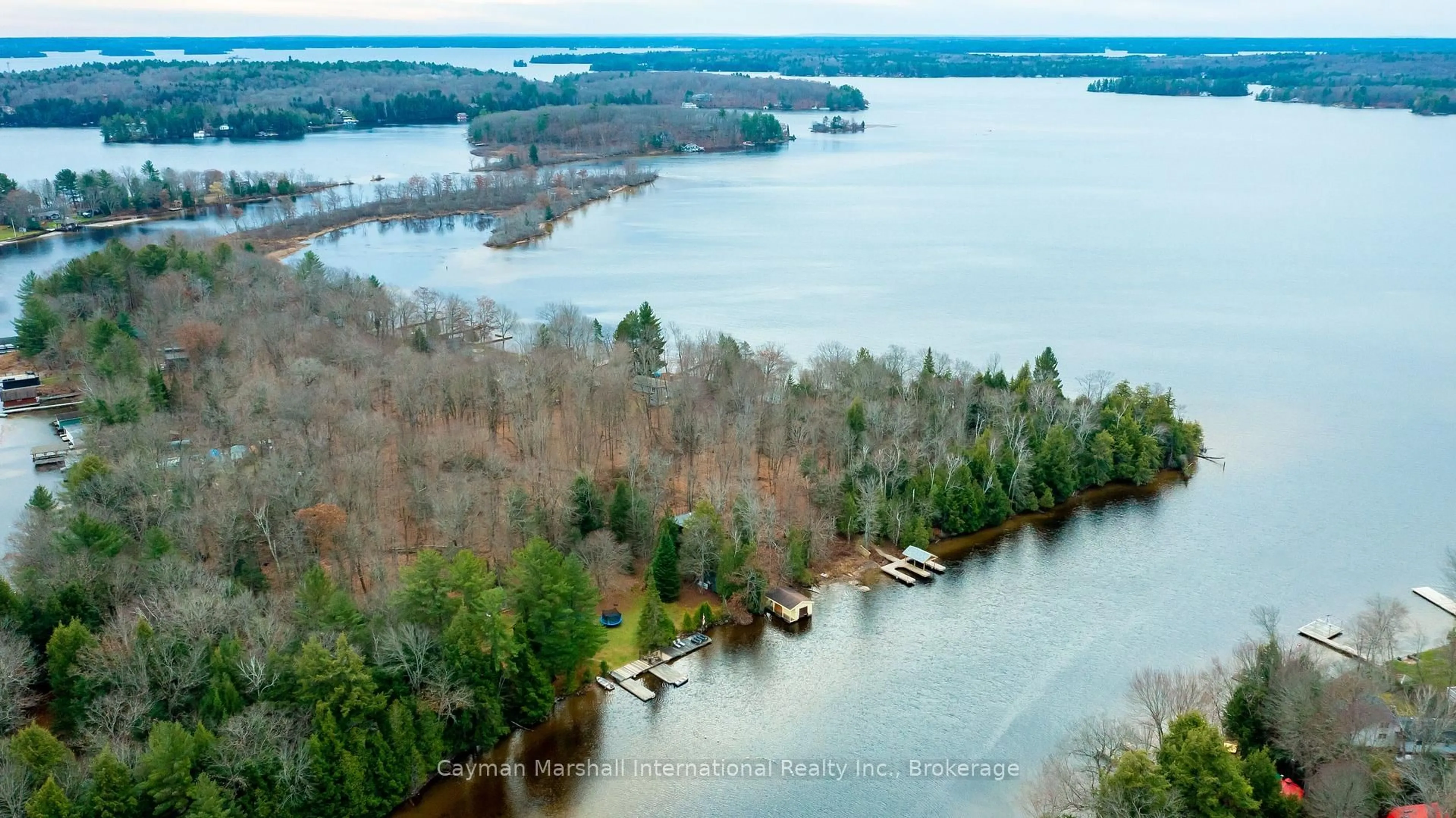 A pic from outside/outdoor area/front of a property/back of a property/a pic from drone, water/lake/river/ocean view for 30 Mcvittie Island, Bracebridge Ontario P1L 1W8
