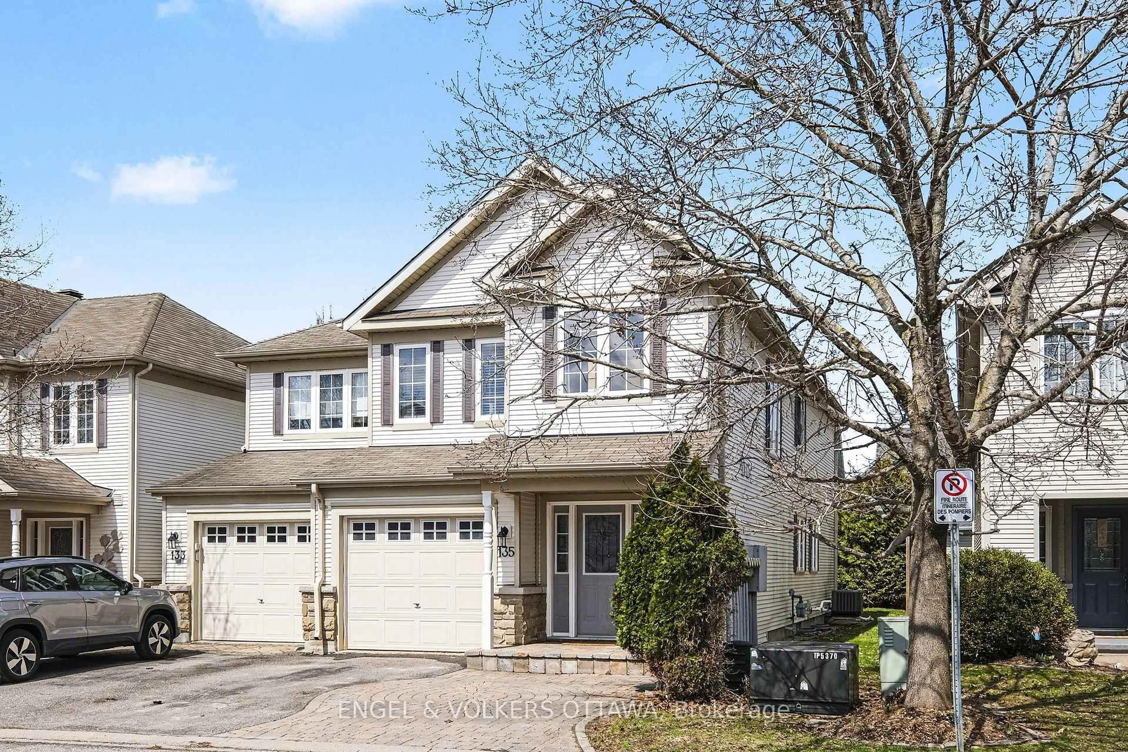 Home with vinyl exterior material, street for 135 Lockhaven Private, Ottawa Ontario K2J 5L6
