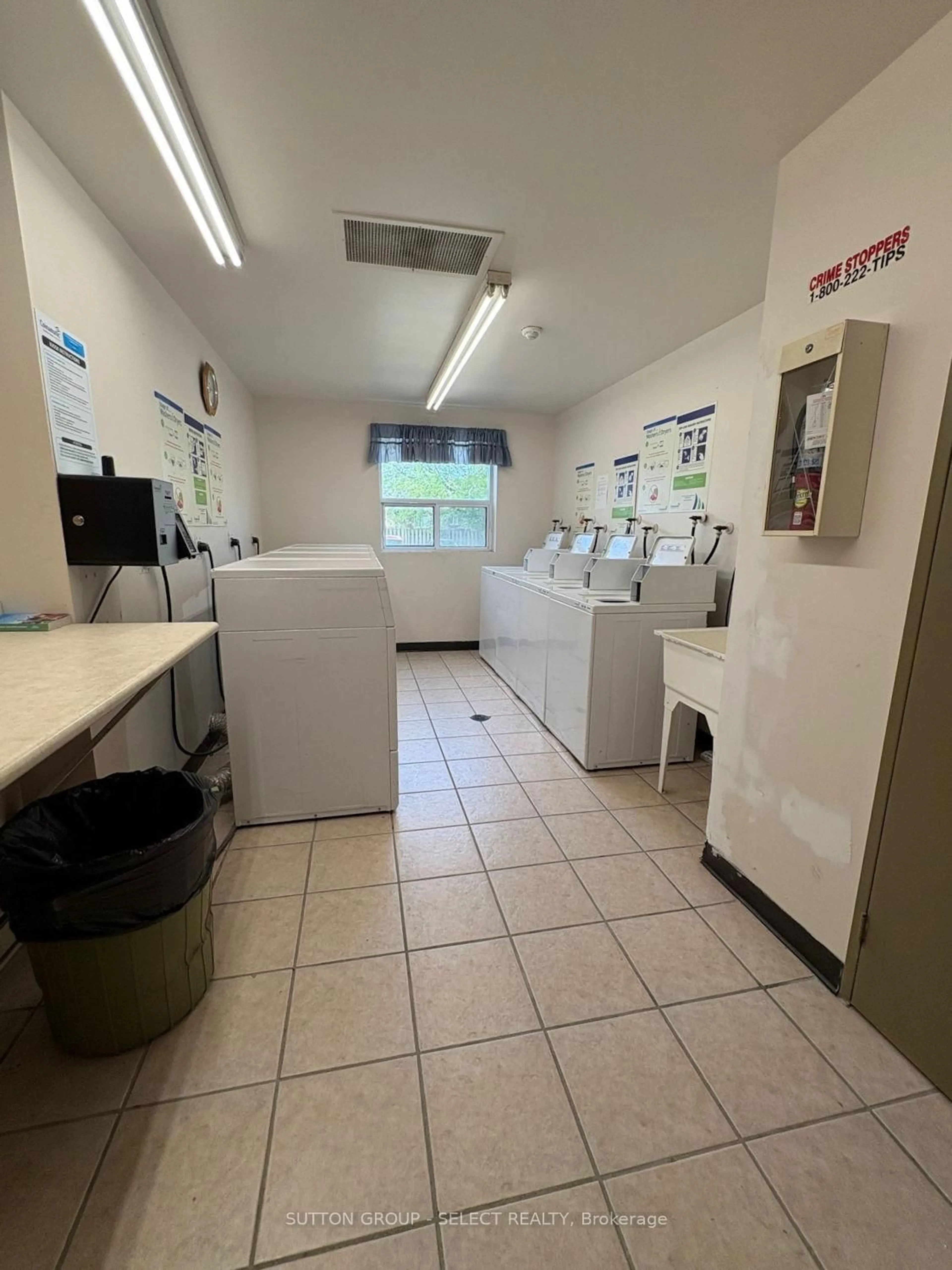 Kitchen with laundary machines, floor is not visible for 130 Park Ave #208, Chatham-Kent Ontario N7M 3V6