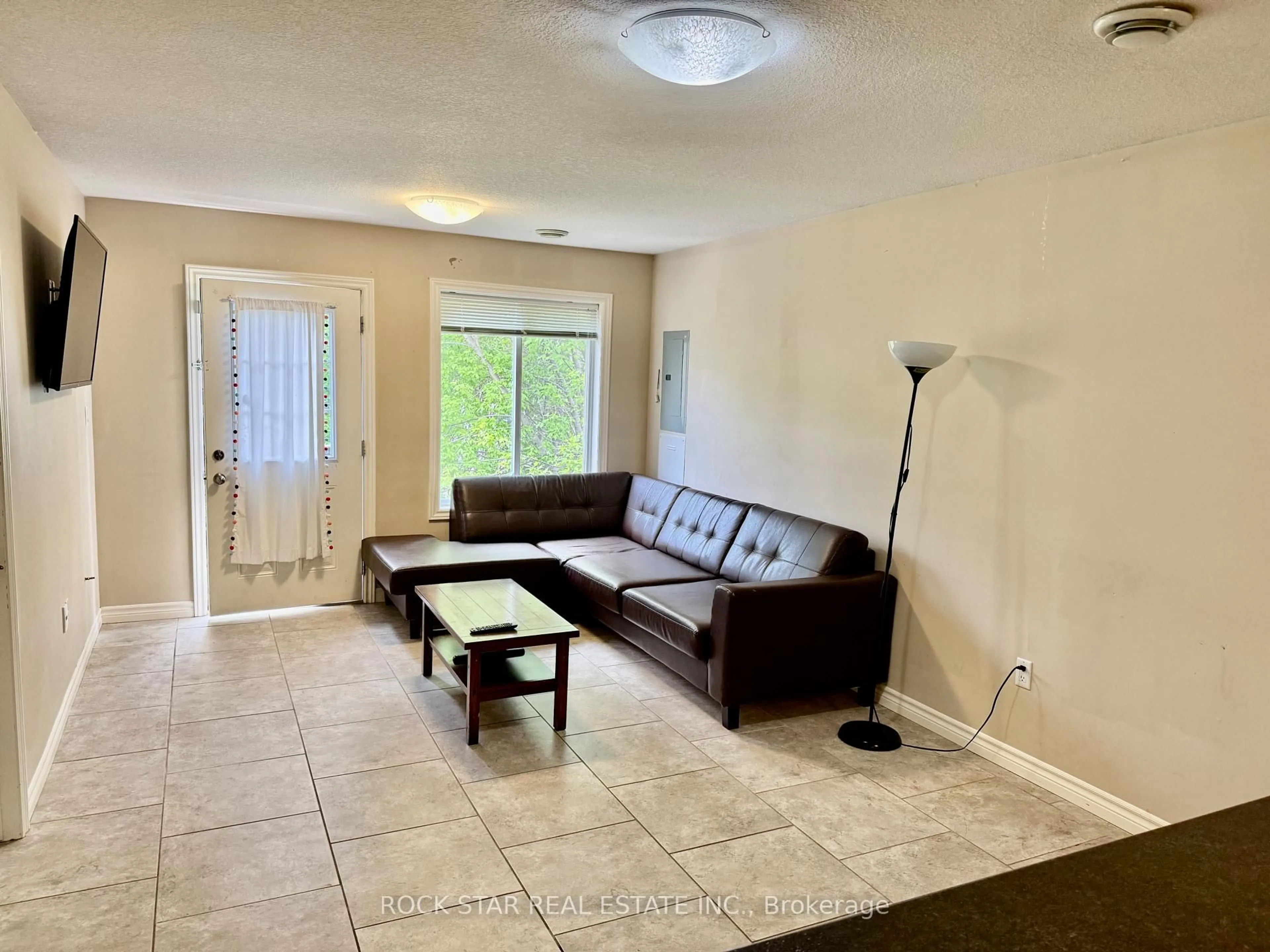 Living room with furniture, ceramic/tile floor for 38 BEAUFORT St, London North Ontario N6G 1A8