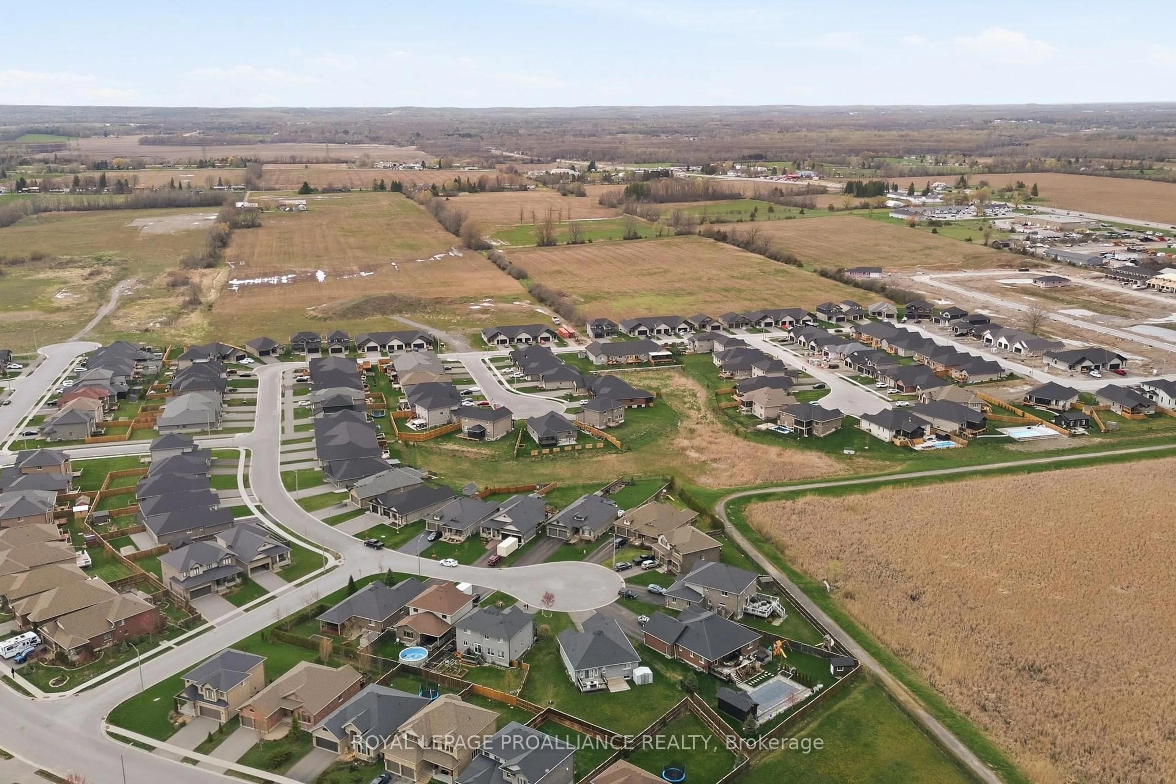A pic from outside/outdoor area/front of a property/back of a property/a pic from drone, mountain view for 18 Trinity Crt, Belleville Ontario K8N 0E7