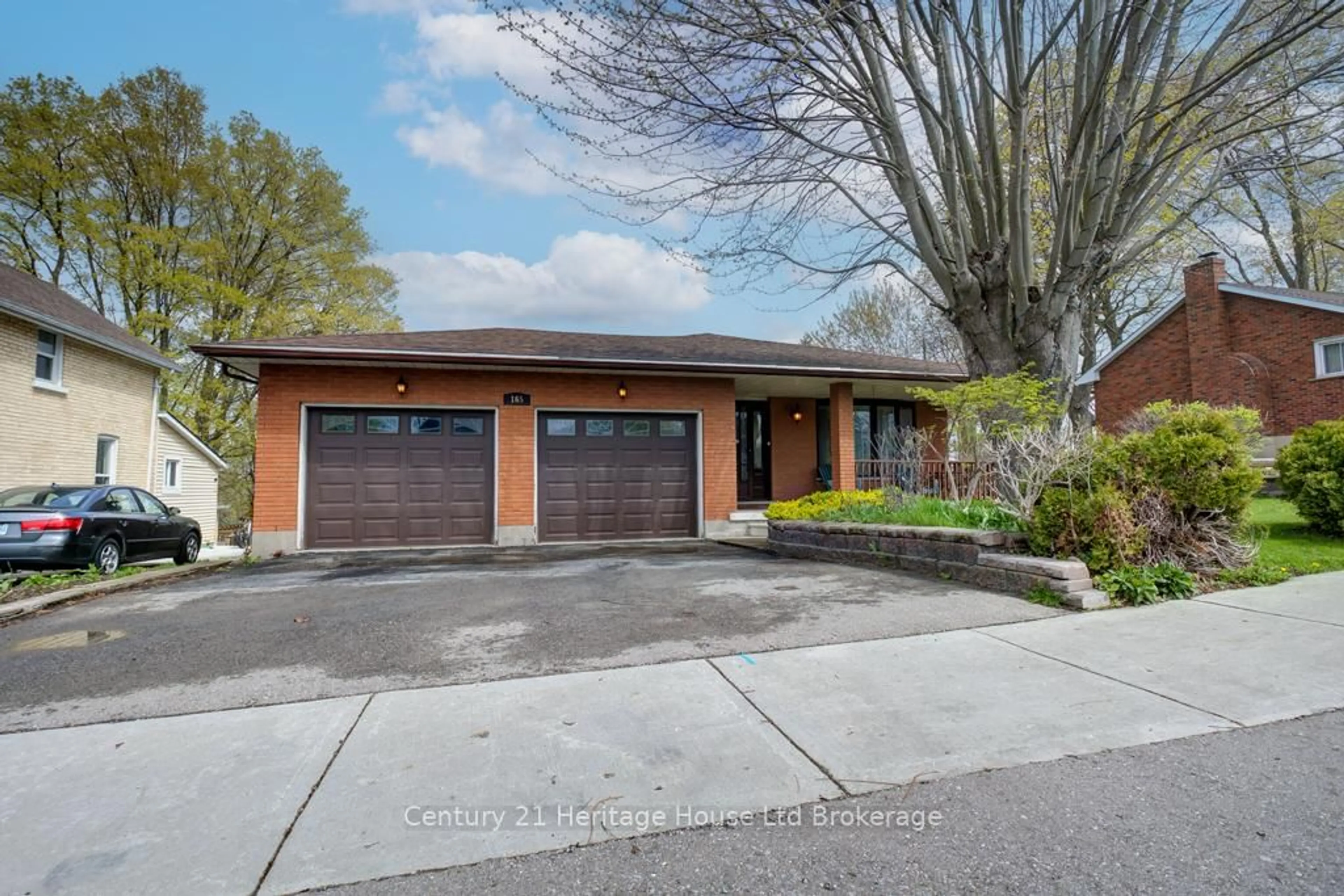 Home with brick exterior material, street for 165 Park Row, Woodstock Ontario N4S 1V9
