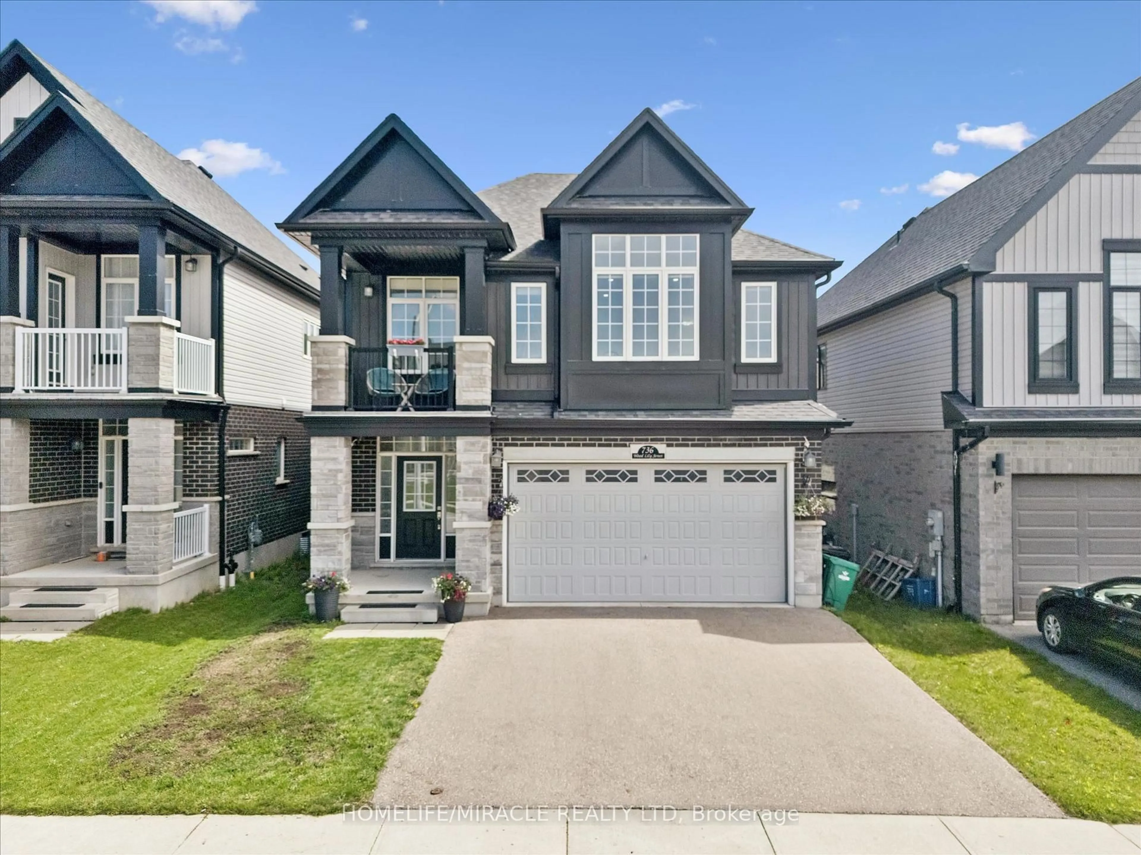 Home with vinyl exterior material, street for 736 Wood Lily St, Waterloo Ontario N2V 0C3