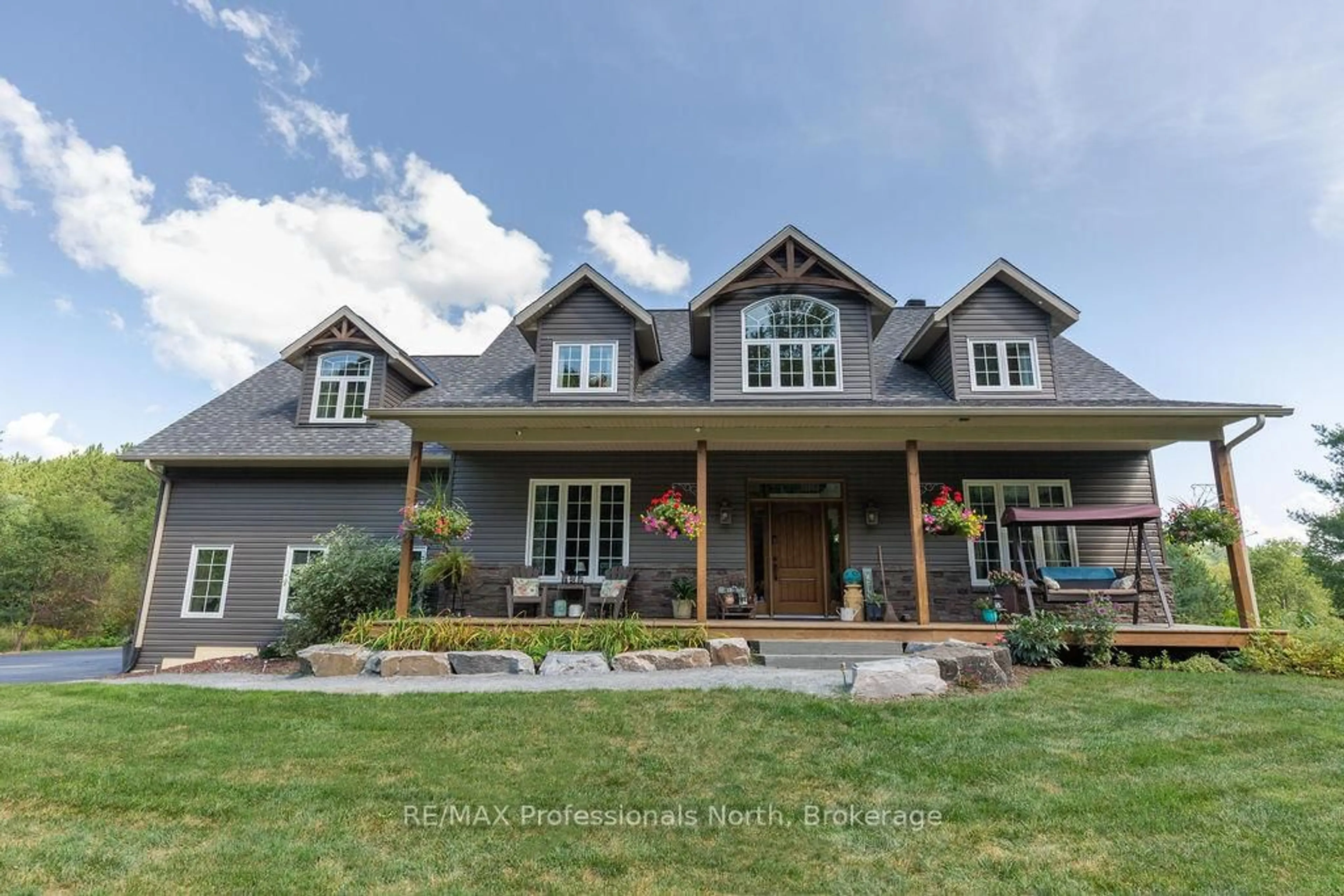 Home with brick exterior material, mountain view for 427 Skyhills Rd, Huntsville Ontario P1H 2N5