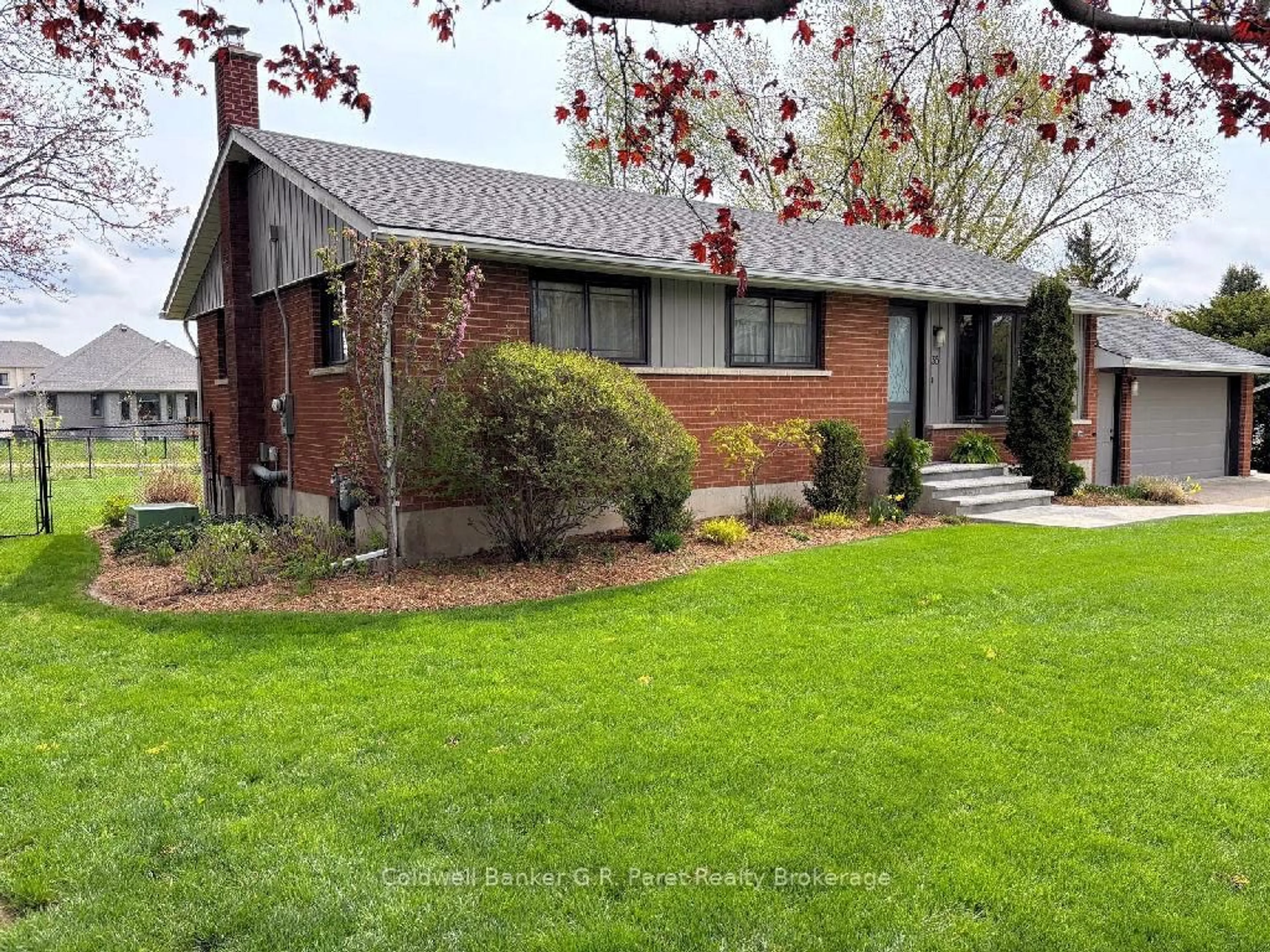 Home with brick exterior material, street for 35 Tanager Dr, Tillsonburg Ontario N4G 1B1