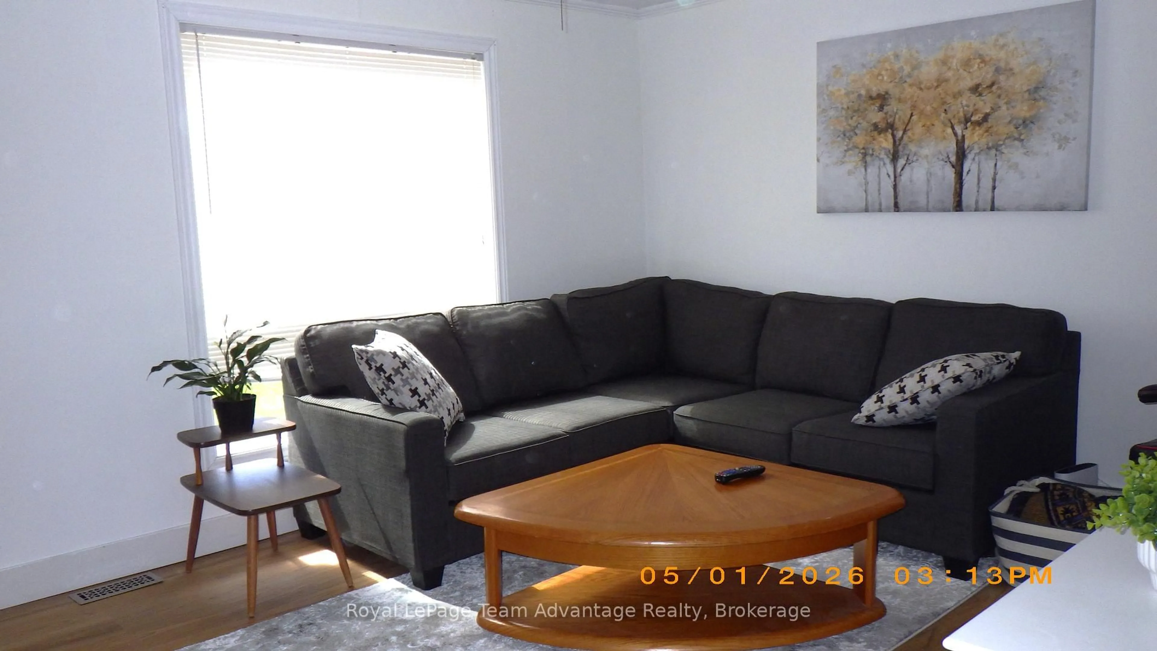 Living room with furniture, wood/laminate floor for 3 Riverdale Rd, Parry Sound Ontario P2A 1N8