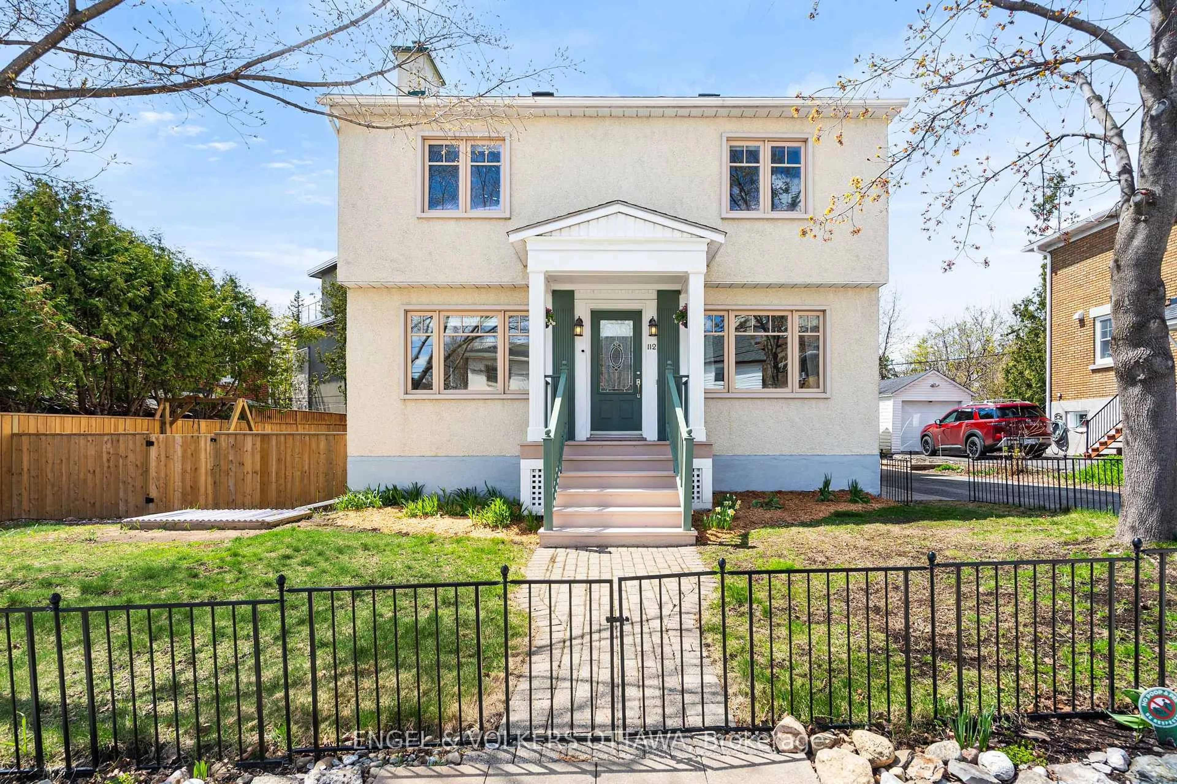 Home with brick exterior material, street for 112 Springfield Rd, Ottawa Ontario K1M 1C6