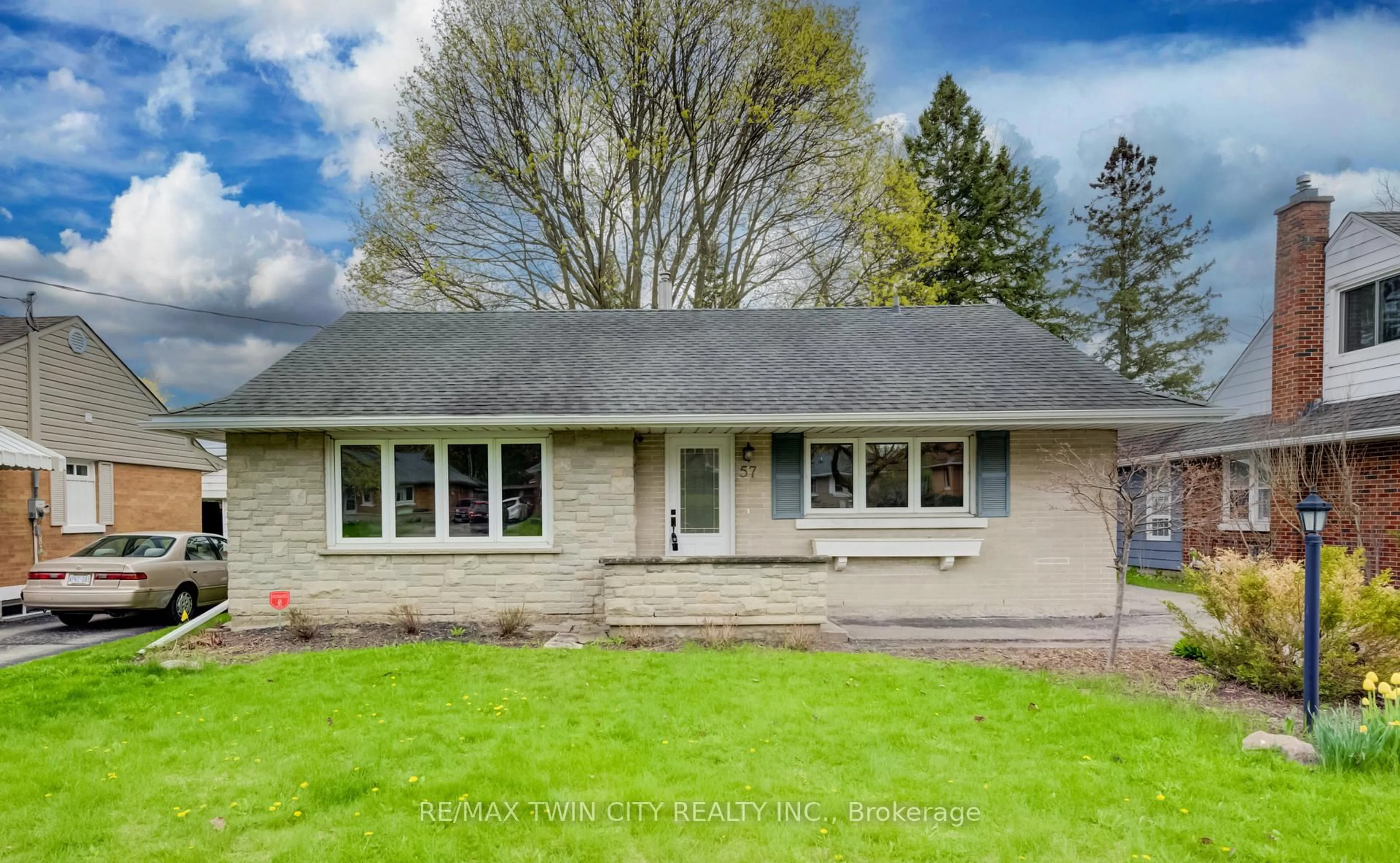 Home with vinyl exterior material, street for 57 Jack Ave, Kitchener Ontario N2M 1Z9