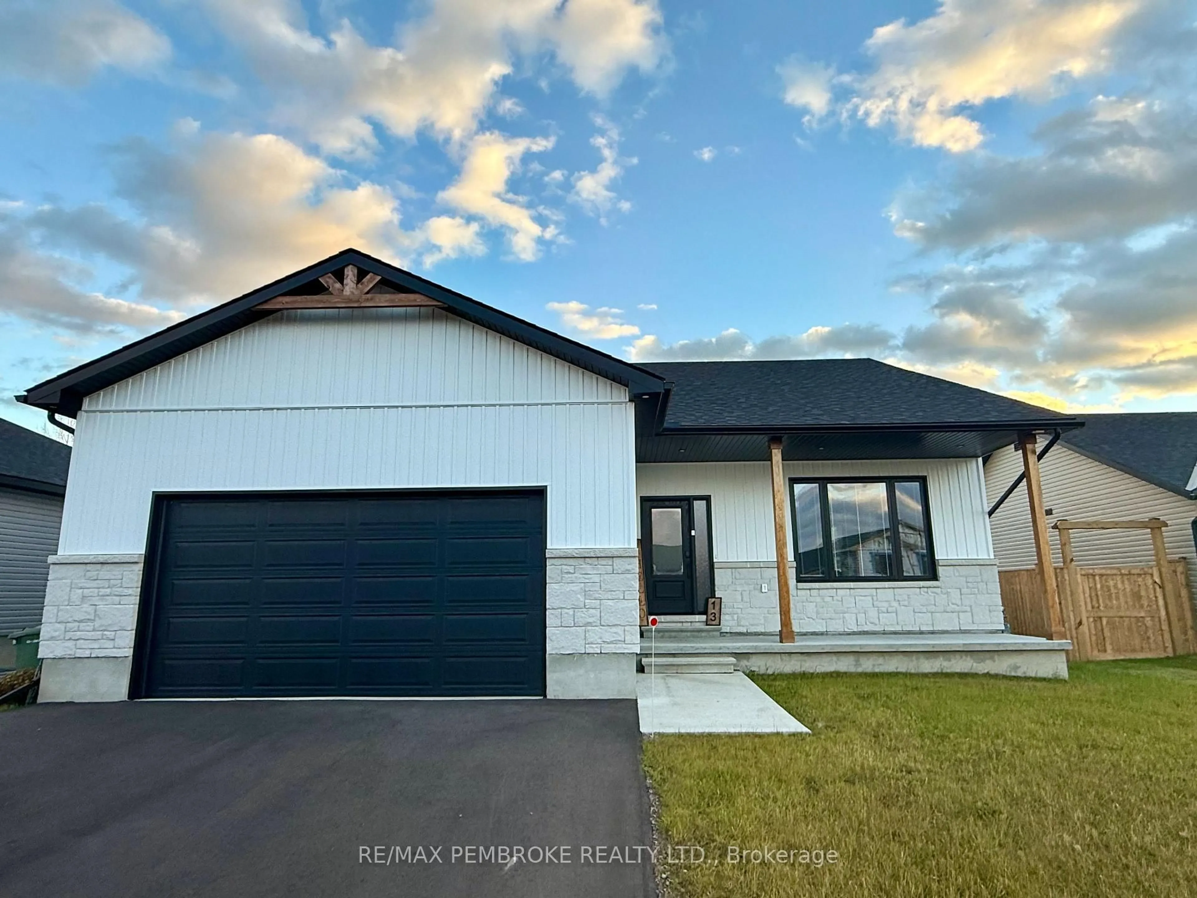 Home with vinyl exterior material, street for 18 Durant St, Petawawa Ontario K8H 0G2