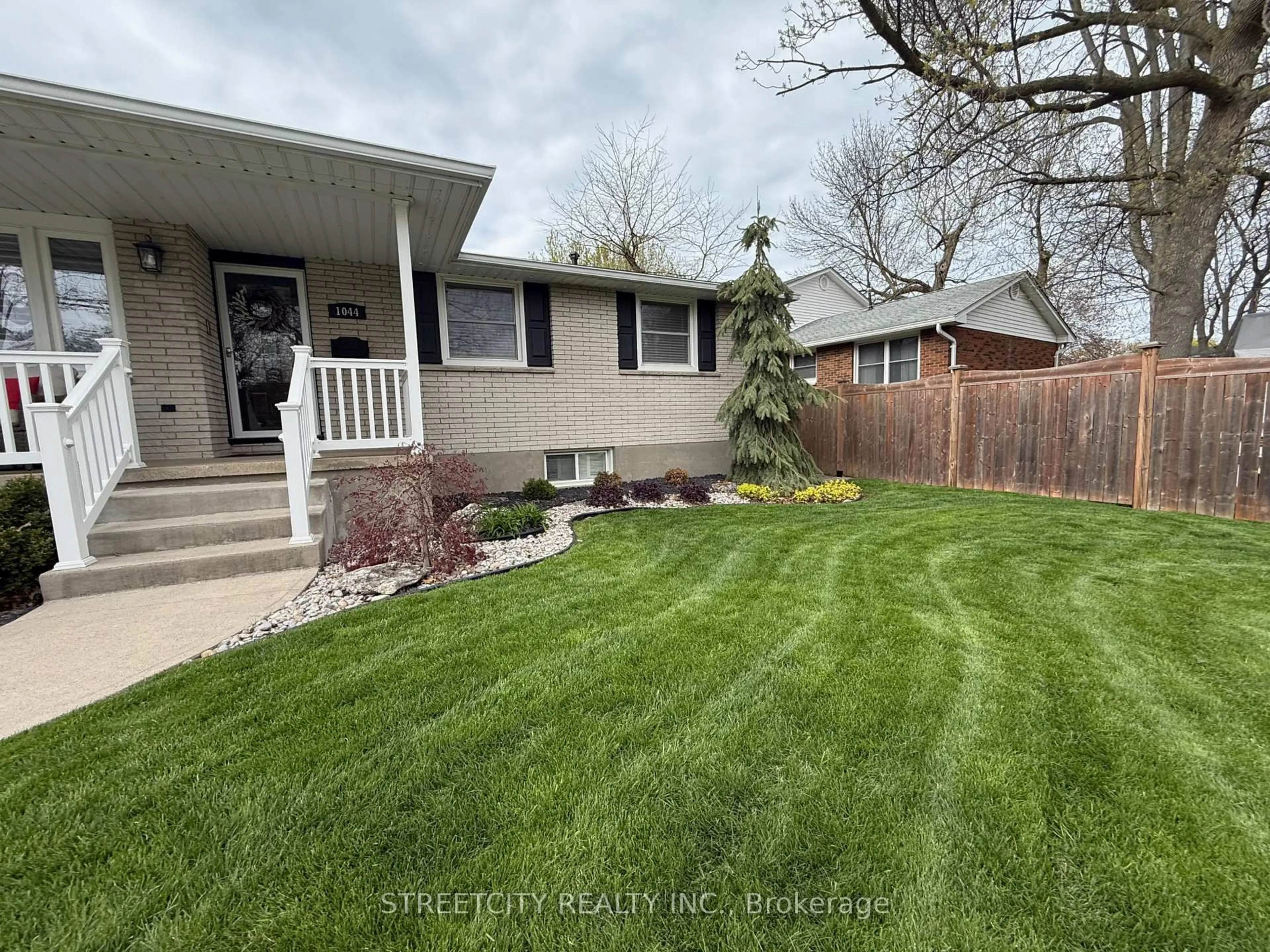 Home with vinyl exterior material, street for 1044 Cathcart Blvd, Sarnia Ontario N7S 2H2