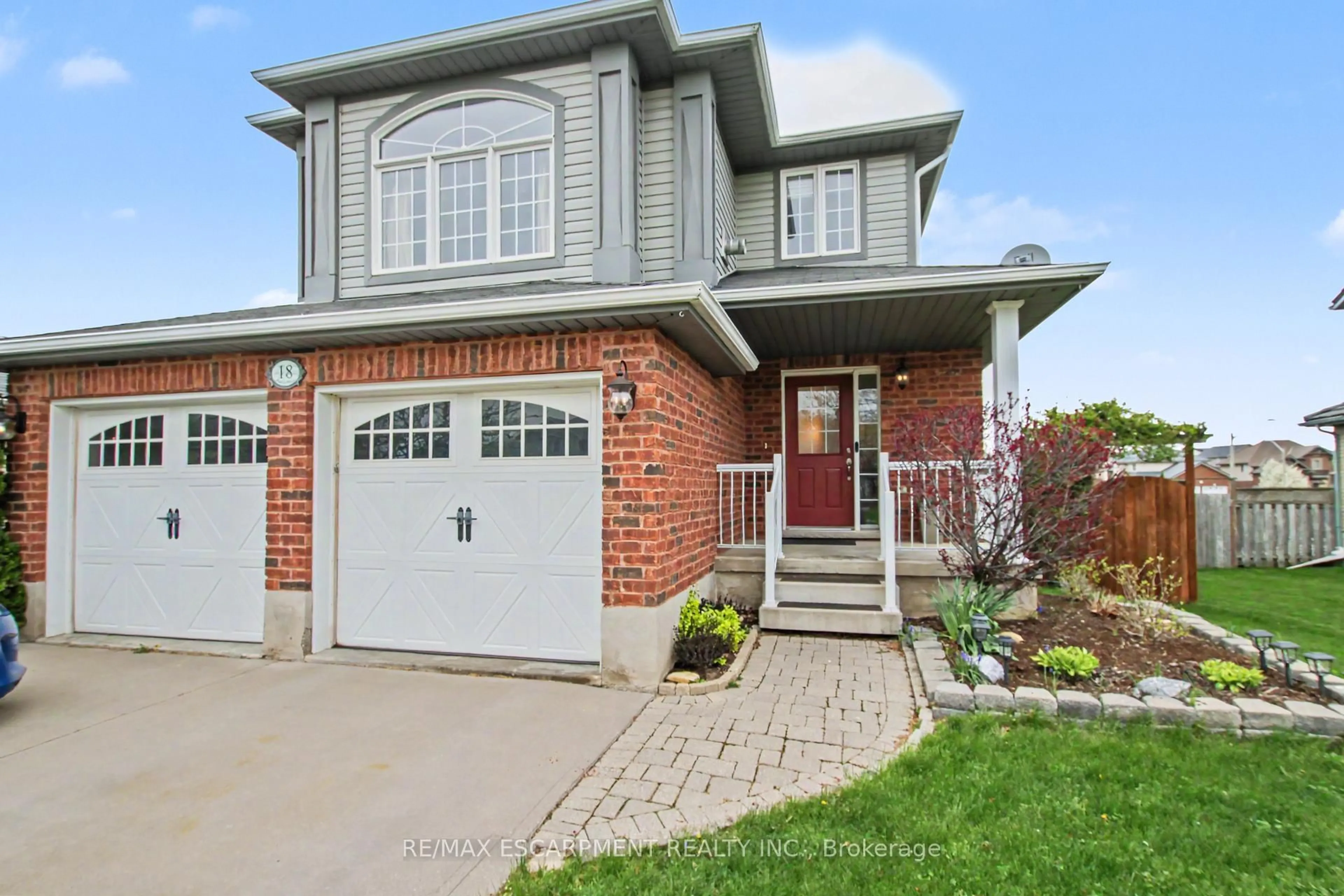 Home with brick exterior material, street for 18 Poldon Dr, Norwich Ontario N0J 1P0