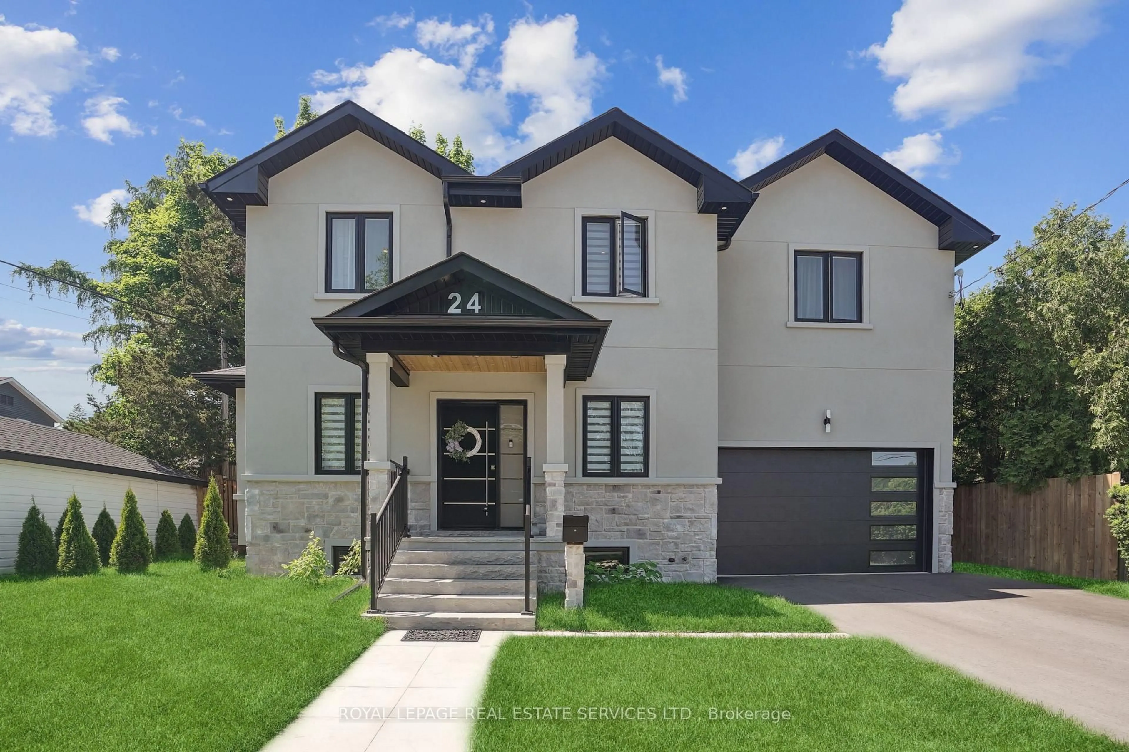 Home with brick exterior material, street for 24 Peel St, Hamilton Ontario L9H 2Z9