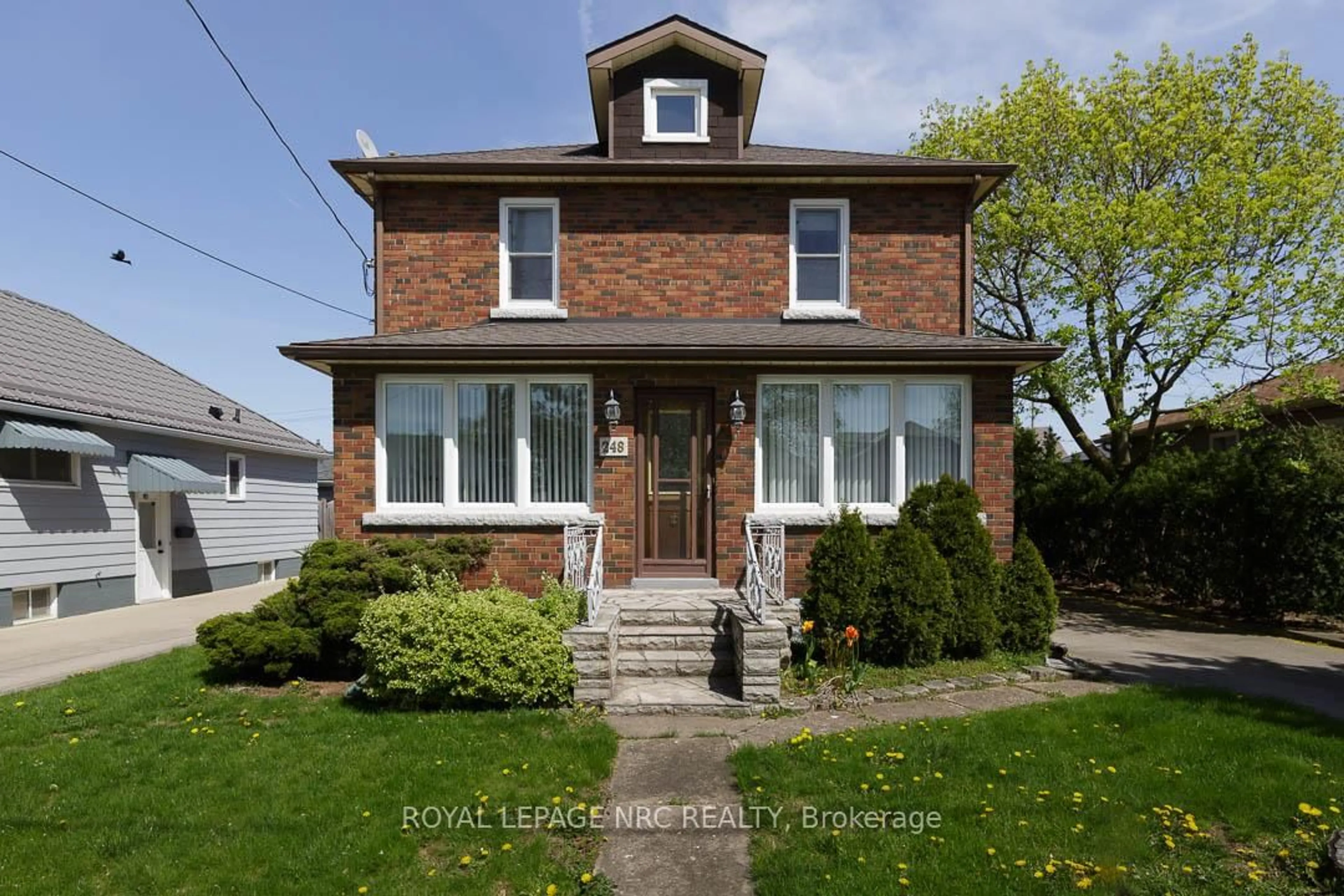 Home with brick exterior material, street for 248 Wallace Ave, Welland Ontario L3B 1R6