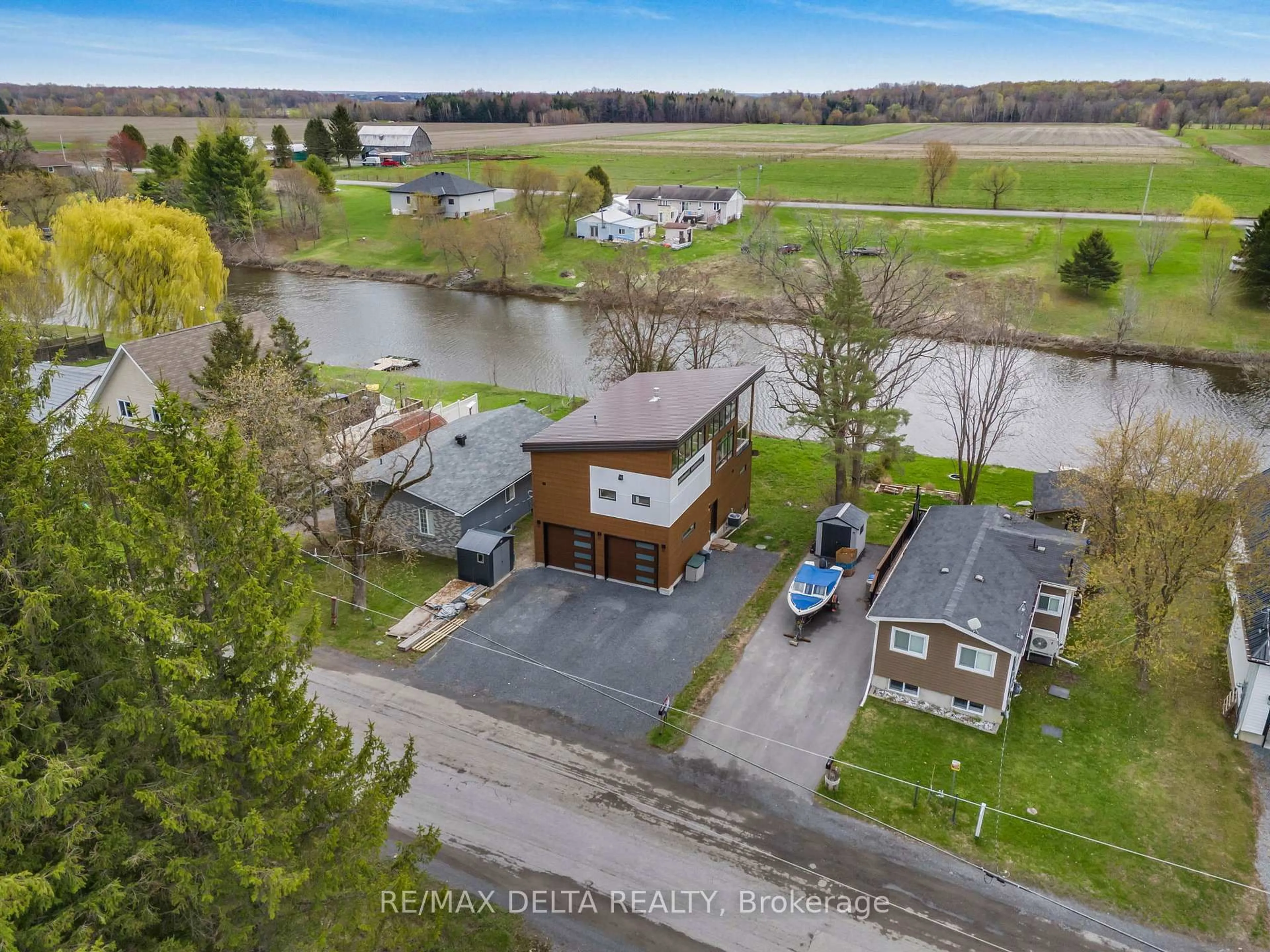 A pic from outside/outdoor area/front of a property/back of a property/a pic from drone, water/lake/river/ocean view for 703 Montee Lebrun, The Nation Ontario K0A 1M0