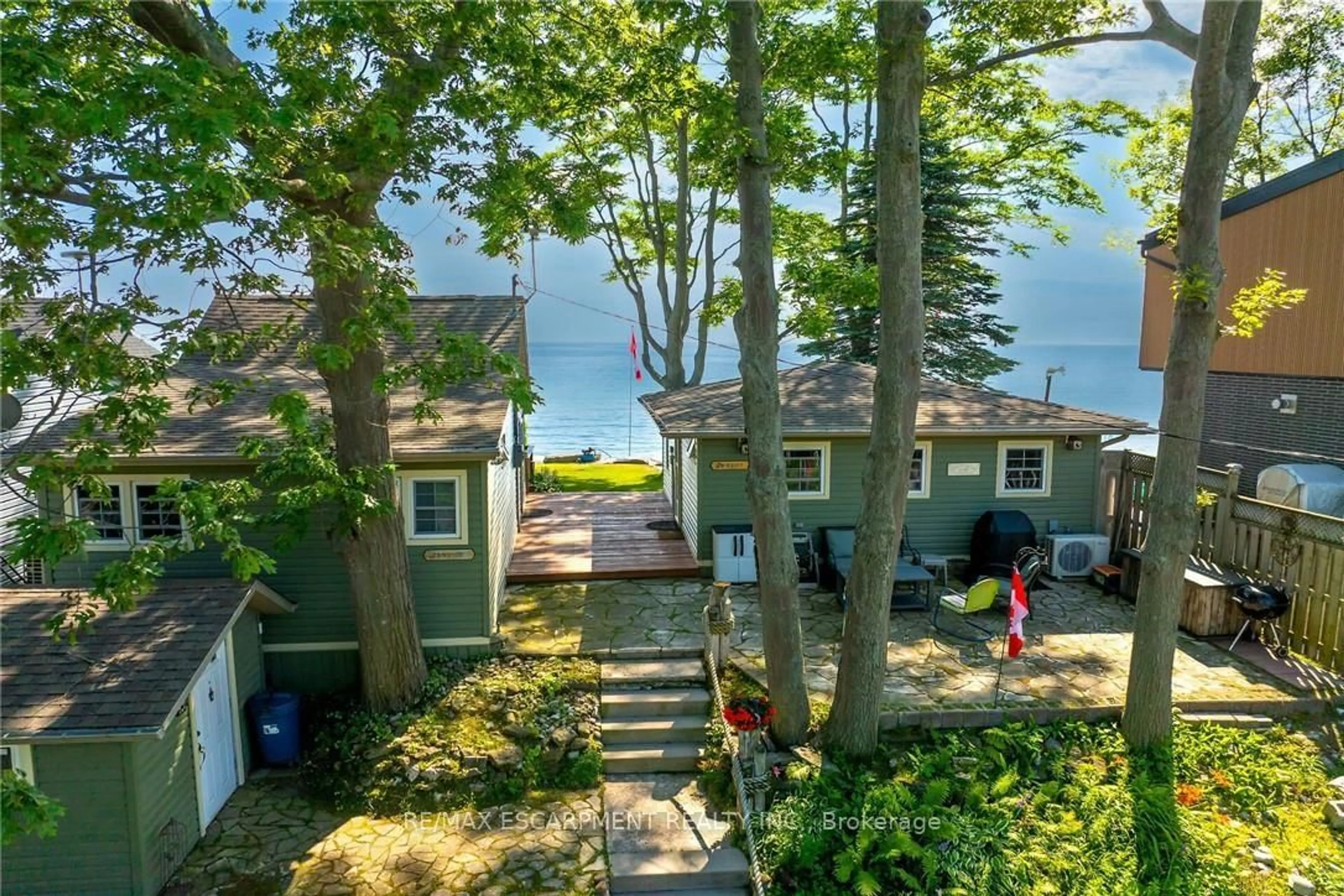 A pic from outside/outdoor area/front of a property/back of a property/a pic from drone, water/lake/river/ocean view for 803 Sandy Bay Rd, Haldimand Ontario N1A 2W6