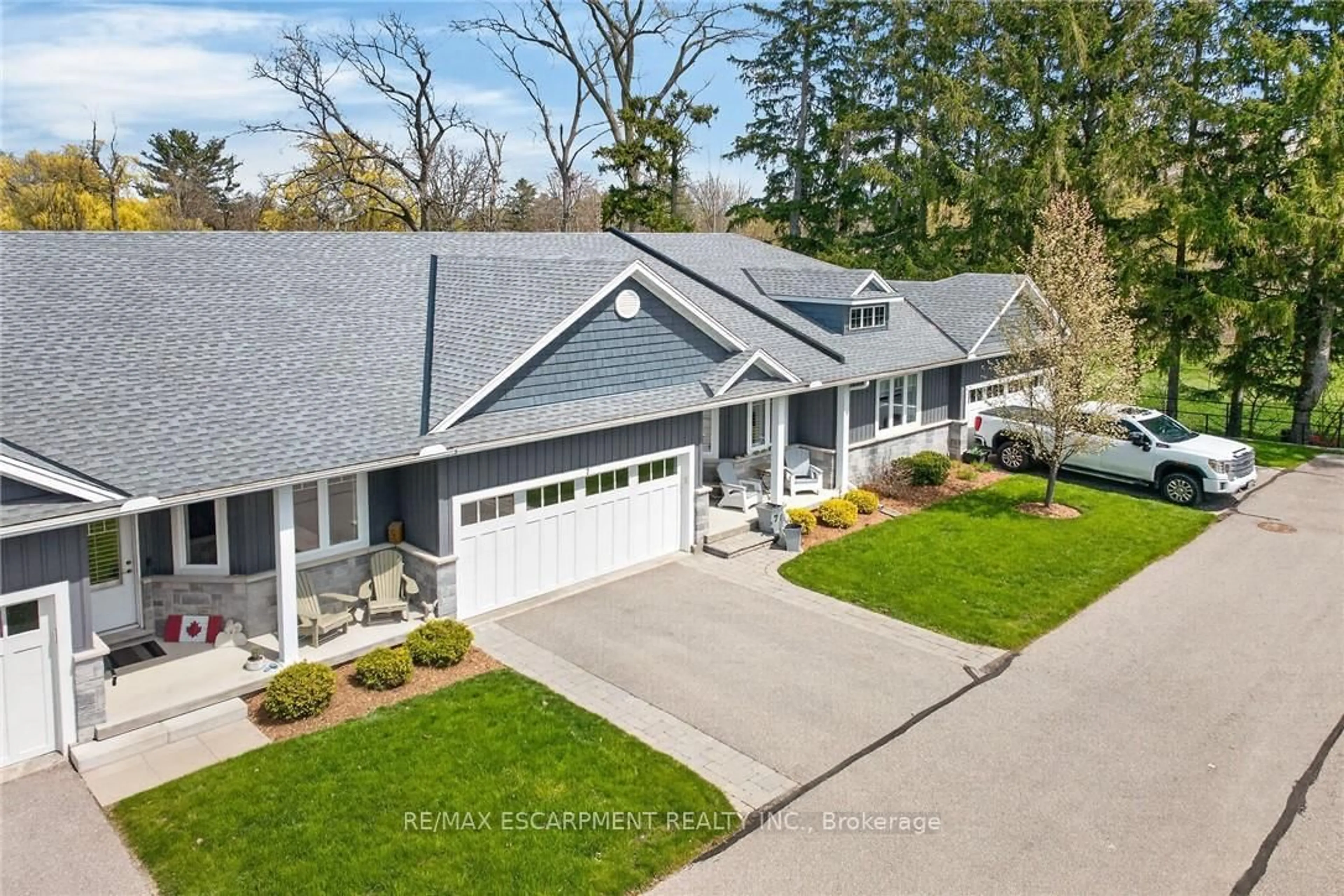 A pic from outside/outdoor area/front of a property/back of a property/a pic from drone, street for 418 Nelson St #7, Norfolk Ontario N0A 1N4