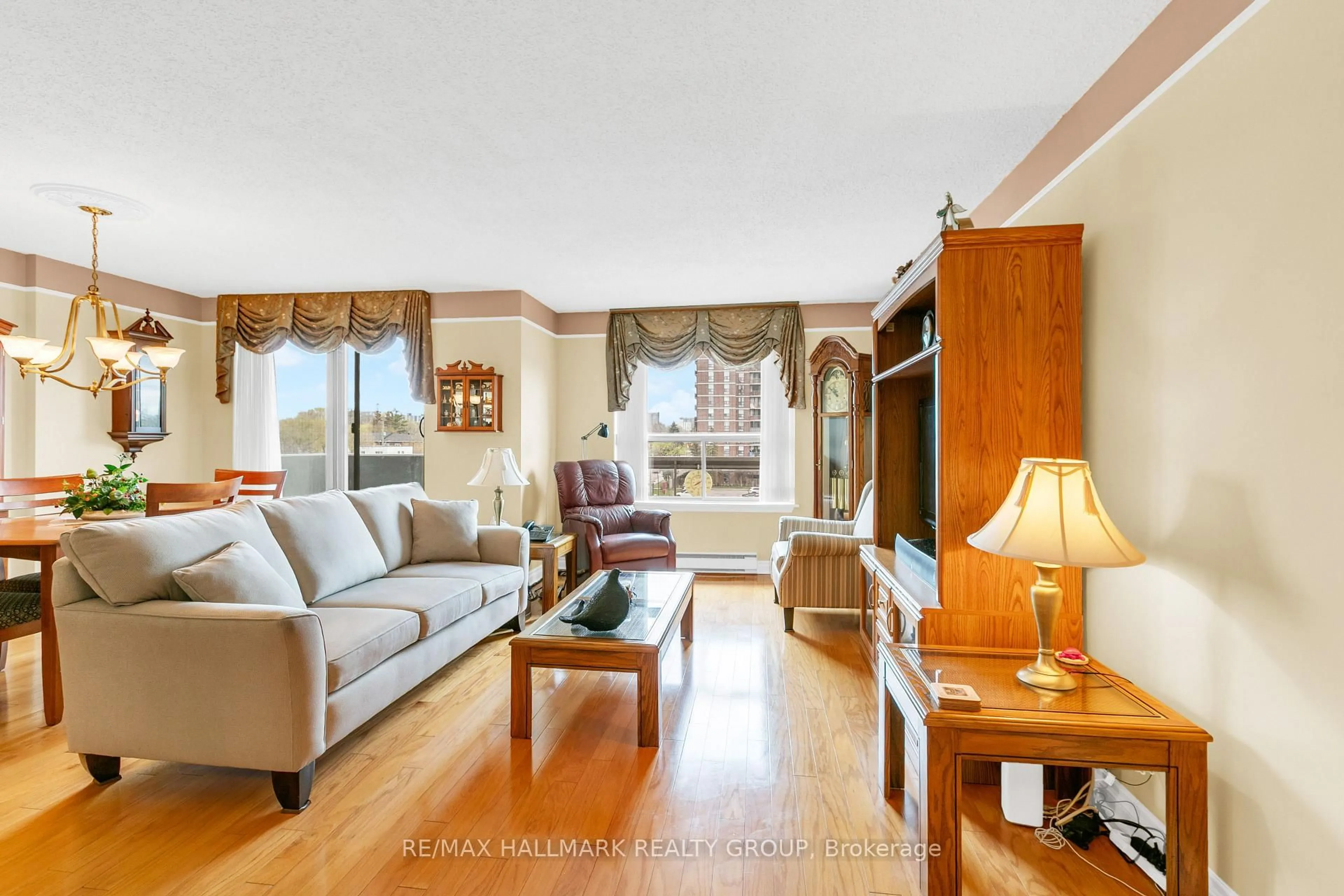 Living room with furniture, unknown for 200 Lafontaine Ave #401, Ottawa Ontario K1L 8K8